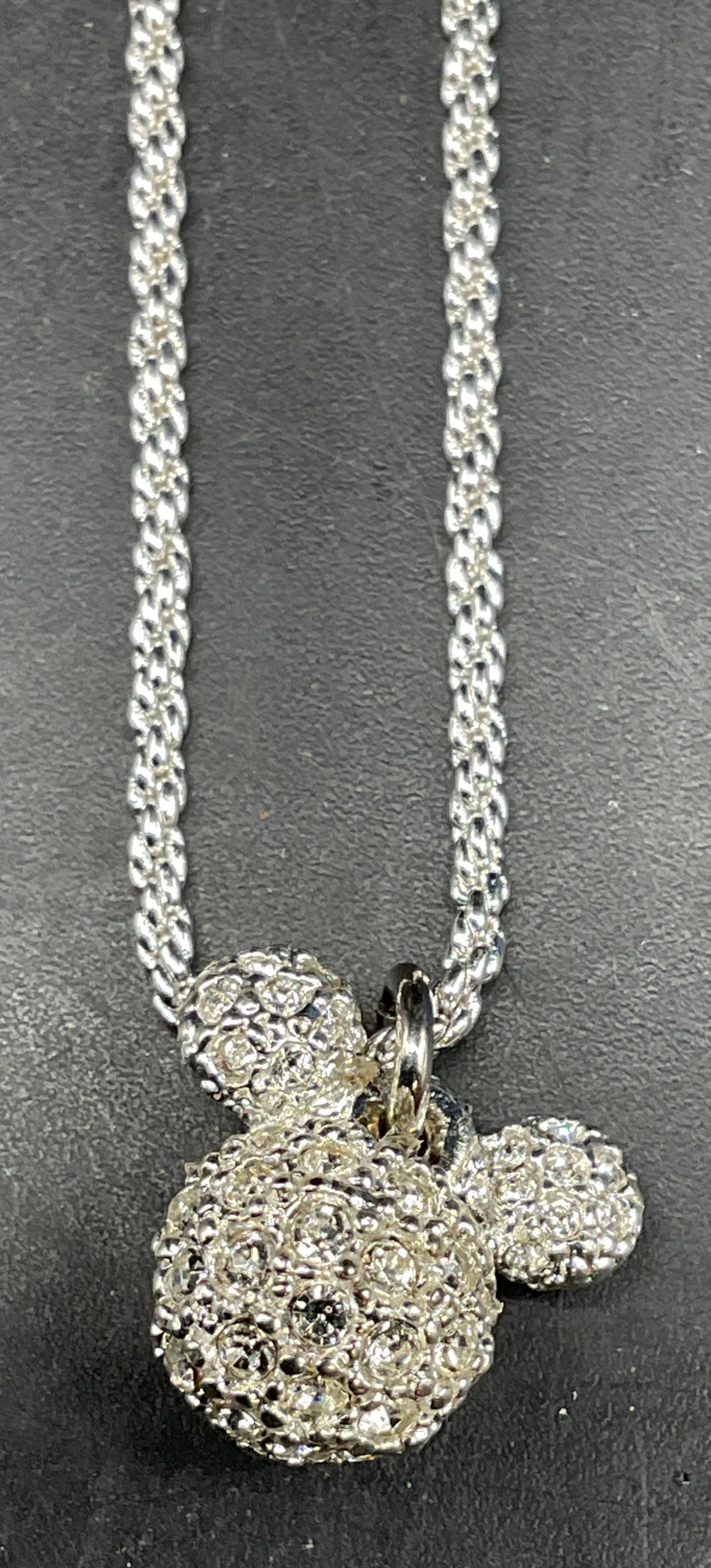 Napier Disney Mickey Crystal Pendant Necklace: Vintage Napier Disney Mickey Mouse silver tone crystal pendant necklace. Drop length 8.5 inches. Some scratching. Jewelry, estate jewelry, costume jewelry, cocktail jewelry, fashion jewelry,