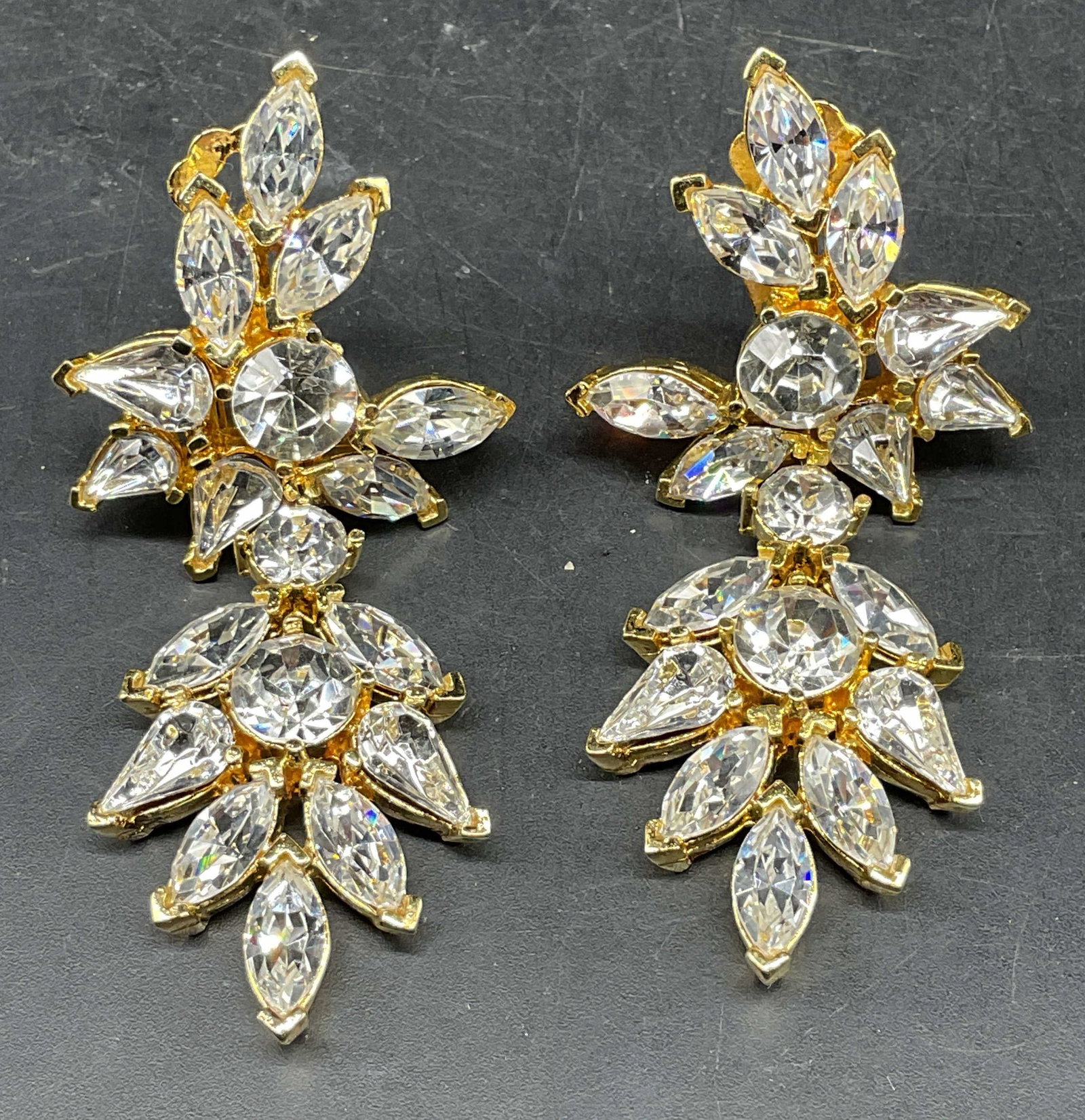 Todd Anthony Gold Tn Crystal Statement Earrings: Vintage Todd Anthony gold tone and colorless crystal statement earrings. Measures approx. 2.75 x 1.25 inches. Some scratching. Jewelry, estate jewelry, costume jewelry, cocktail jewelry, fashion