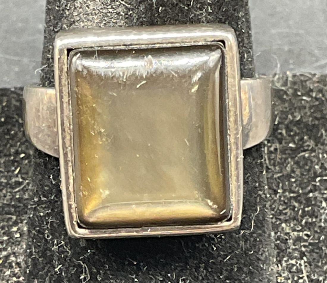 Melissa Rivers Sterling Silver Iridescent Ring: Melissa Rivers sterling silver ring with faux mother of pearl setting. Ring size 8.5. Marked sterling. Total weight 10.6 grams. Includes original box. Some scratching. Jewelry, estate jewelry,