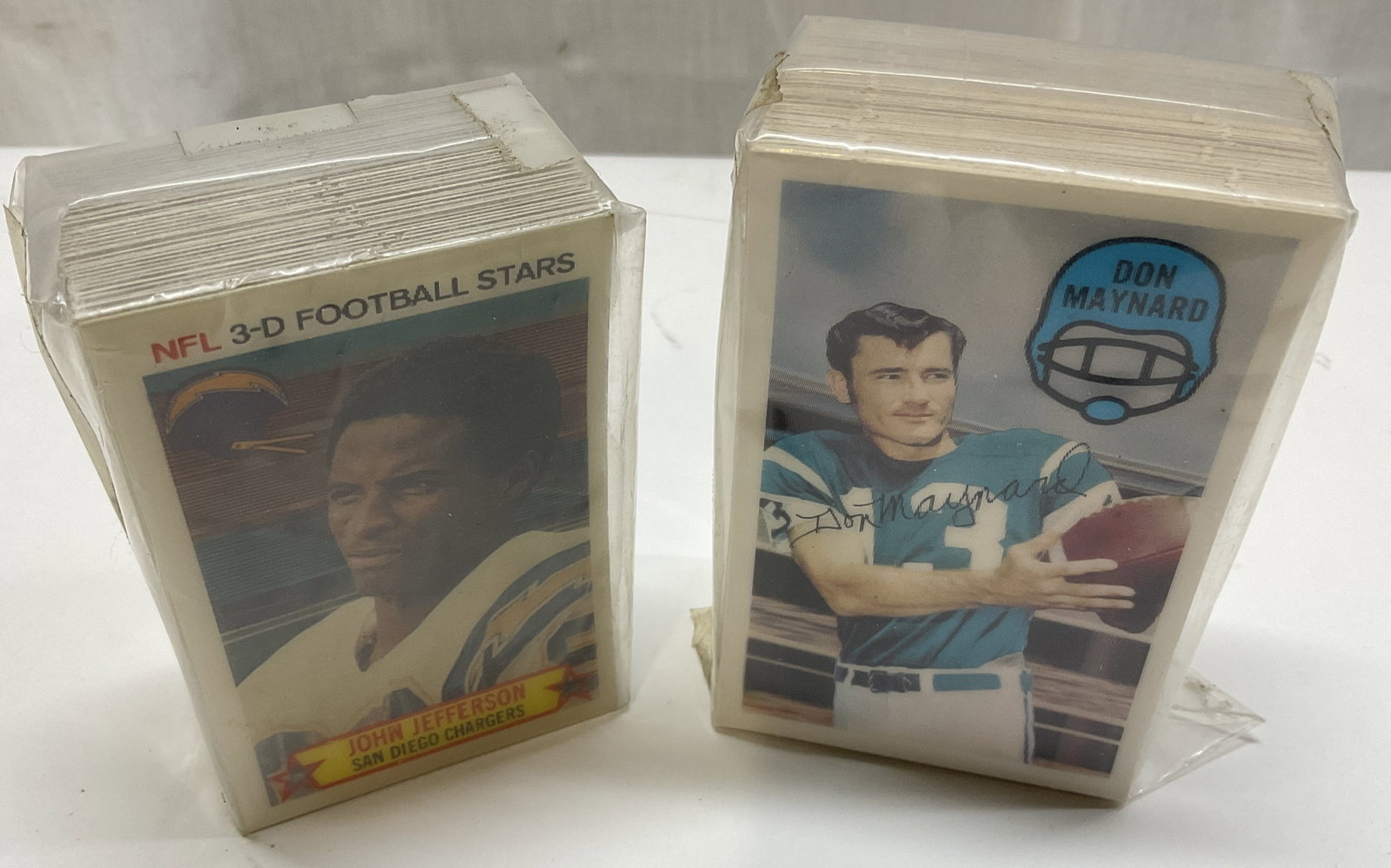 100+ 70s&80s NFL Players Assoc 3D Football Cards: More than 100 NFL Players Association 3D Football Sports Cards. Includes a Holographic Card of Don Maynard of the New York Jets with Facsimile Signature and John Jefferson of the San Diego Chargers.