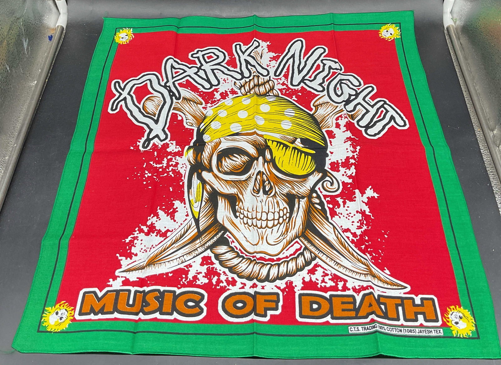 CTS Trading Skull Dark Night Cotton Bandana: CTS Trading green and red skull print Dark Night Music of Death cotton bandana. Measures approx. 20 x 19.5 inches. Some wear consistent with exposure. CTs trading bandana, cotton bandana, skull