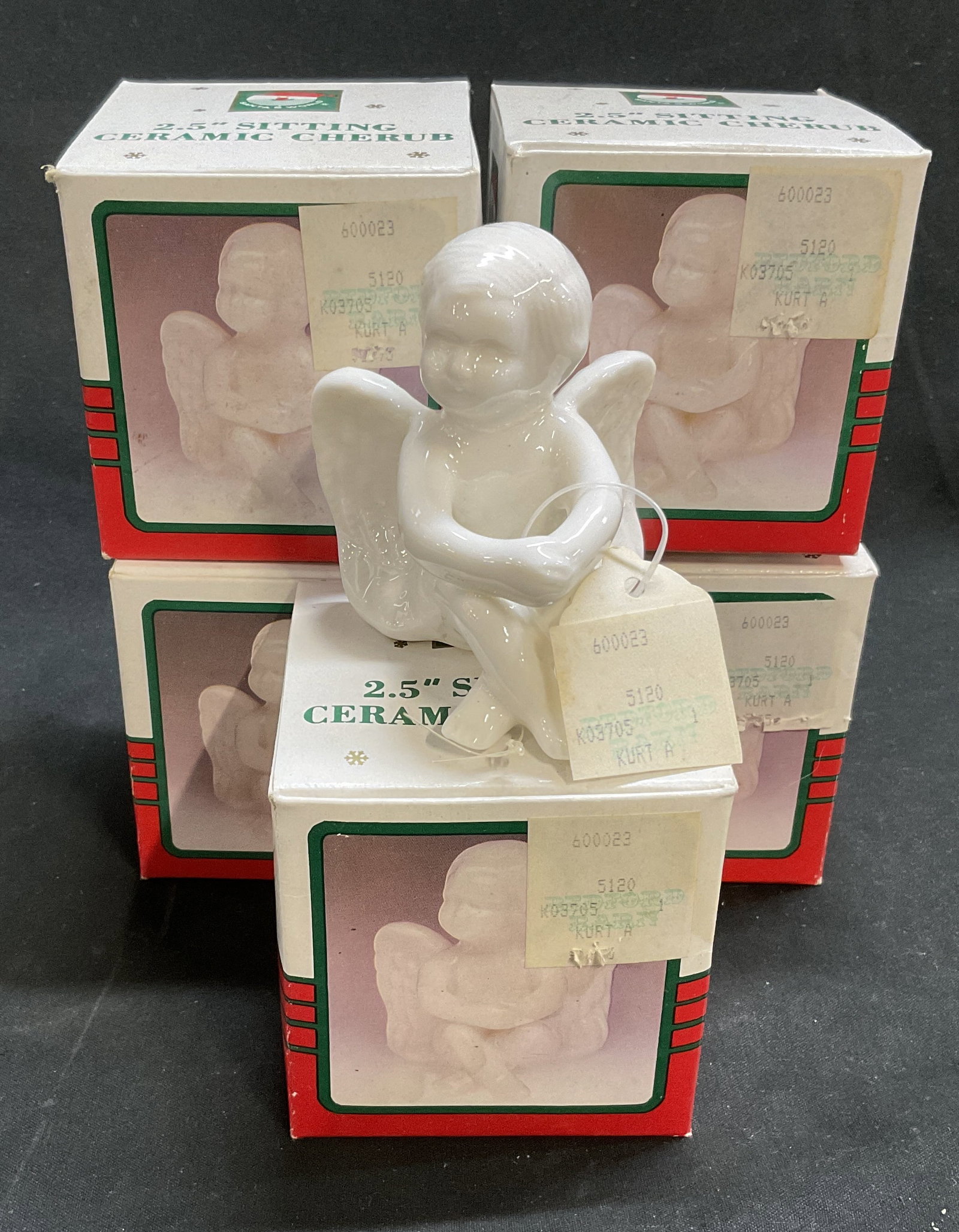 Lt5 Kurt Adler Santas World Ceramic Cherubs: 5 Kurt Adler Santas World 2.5in Sitting White Ceramic Cherubs in Original Boxes. Originally Sold at Bedford Barn. Condition Consistent With Exposure. Only One Examined Out of Box. Measures app 2.5in