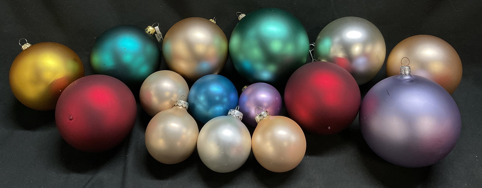 Lt15 Vintage Colorful Glass Ball Ornaments: 15 Vintage Colorful Glass Ball Ornaments. Teal, Beige, Red, Purple, Yellow, Silver and Blue. Various Sizes. Largest Measures app 5in H x 4in Diam. One with Illegible Brand on Tag. Scratching Present.