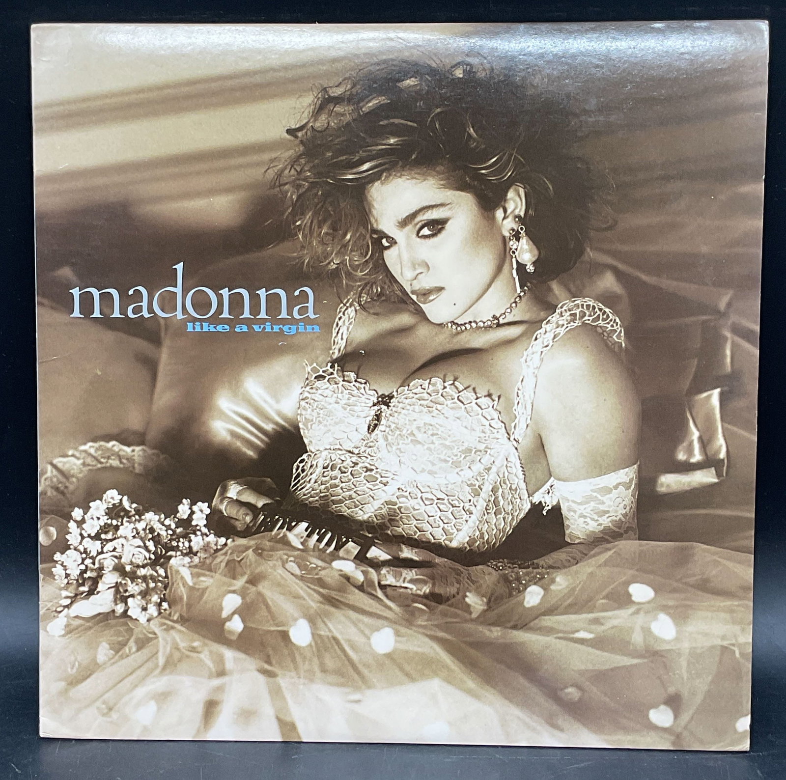 Madonna Like A Virgin Vinyl Record 1984: Madonna, Like A Virgin. Vinyl record. 1 25157. 1984. Not play tested. Sleeve measures approx. 12.25 x 12.25 inches. Wear including scratching. Record, vinyl record, vintage record, collectible record,
