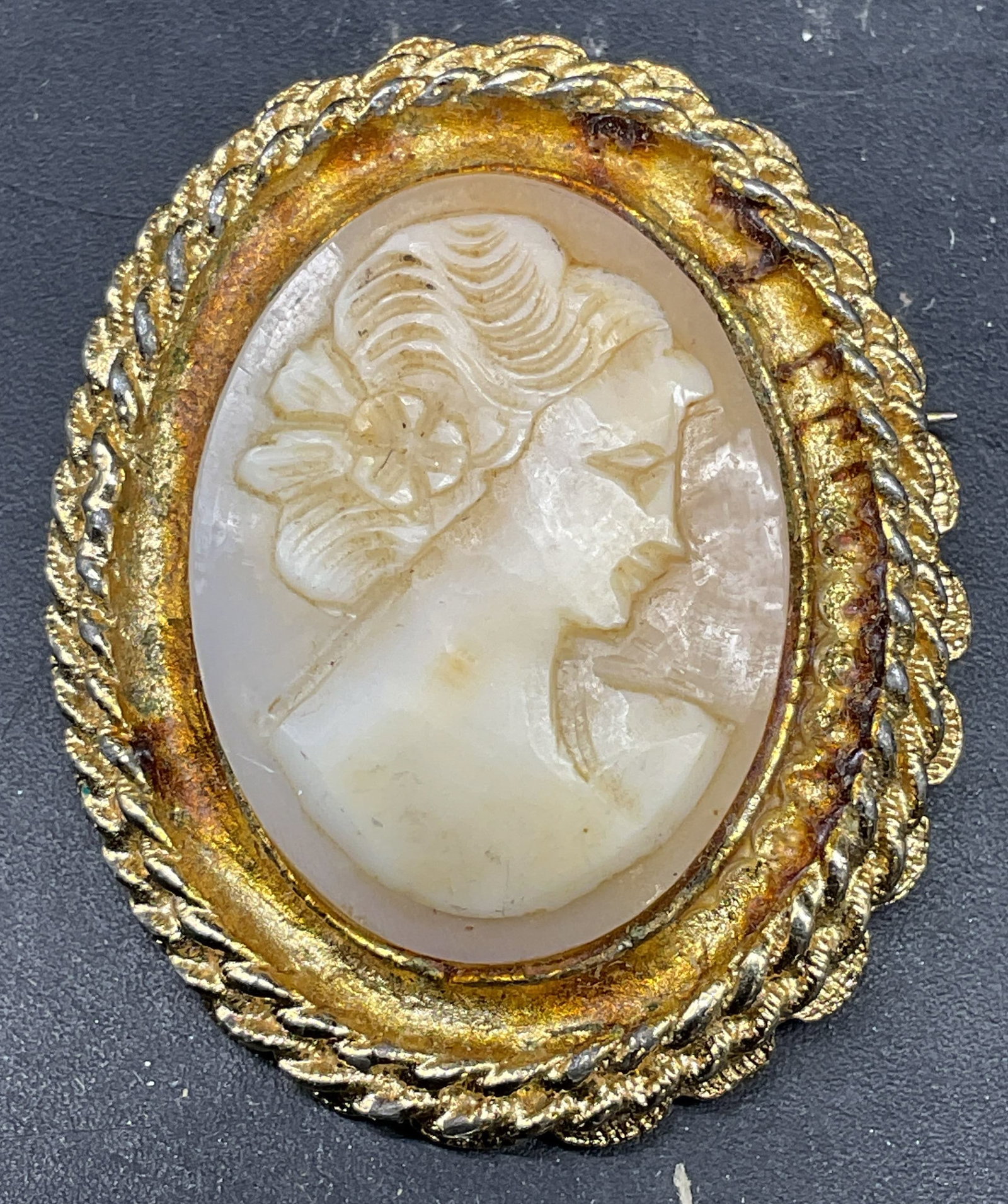 Vintage Gold Tone Carved Cameo Brooch: Vintage gold tone carved resin cameo brooch. Measures approx. 1.5 x 1.25 inches. Some scratching. Jewelry, estate jewelry, costume jewelry, cocktail jewelry, fashion jewelry, accessories, fashion acce