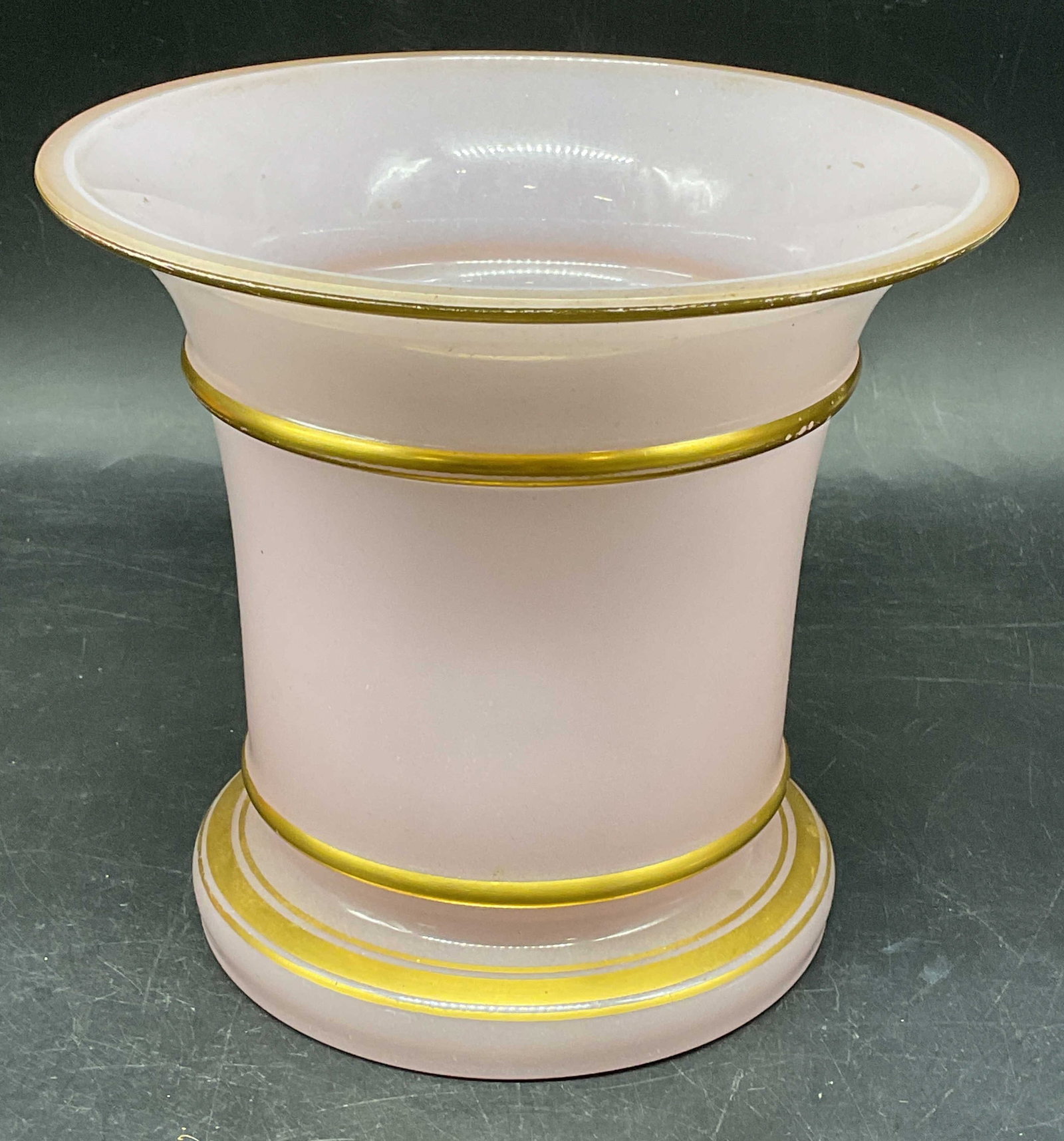 Antique Pink Opaline Glass Fluted Vase: Antique pink opal one glass vase with gilt borders. Fluted rim. Style of Baccarat, no signature. Measures approx. 6.25 x 5.75 inches. Some loss to paint, scratching. Antiques, collectibles, Opaline