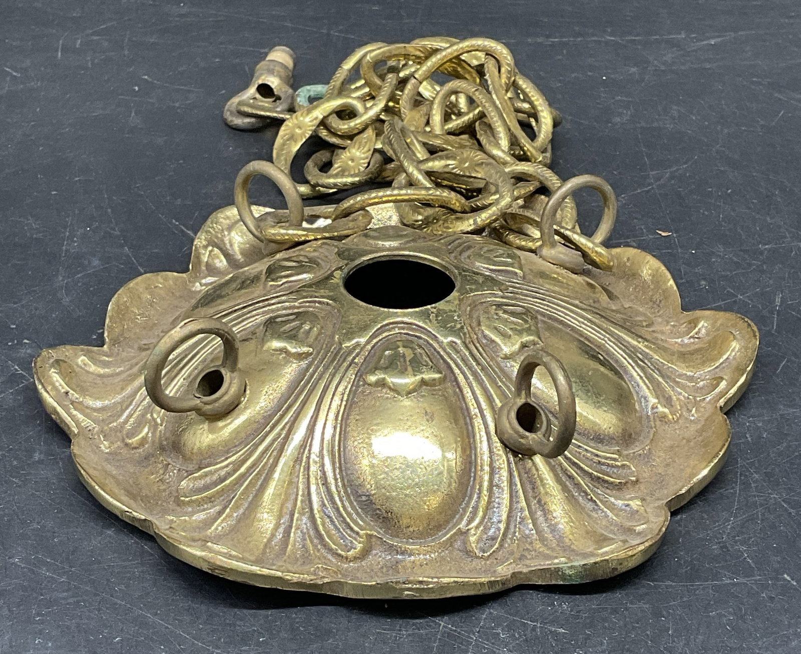 Vintage Ornate Brass Light Fixture Canopy: Vintage ornate brass light fixture canopy with chain. Measures approx. 6.5 inches wide. Some scratching and patina. Light fixture canopy, brass canopy, home decor, home accessories, homewares, 10 cs