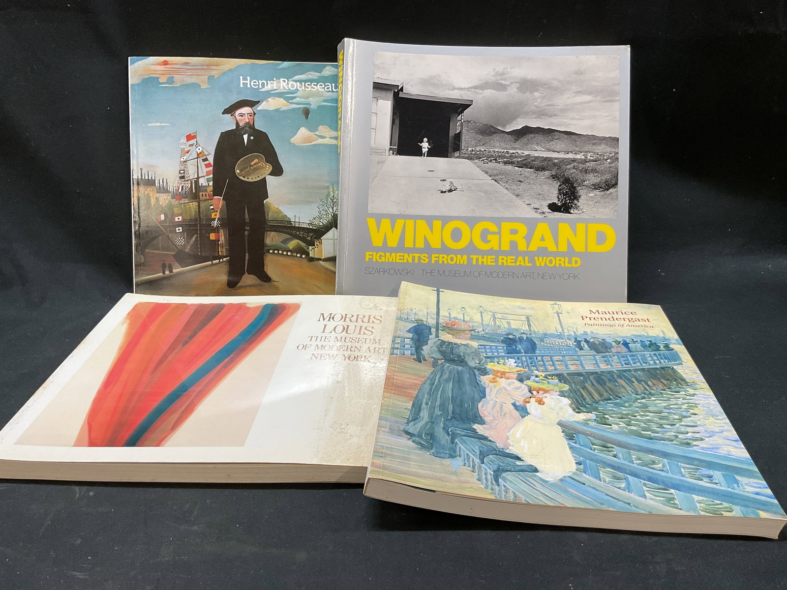Lot 4 Assorted Art Books Rousseau, Winogrand+: Lot of 4 assorted Art books. Henri Rosseau, published by The Museum of Modern Art, 1985. Maurice Prendergast Paintings Of America, published by Adelson Galleries, 2003. Morris Louis by John