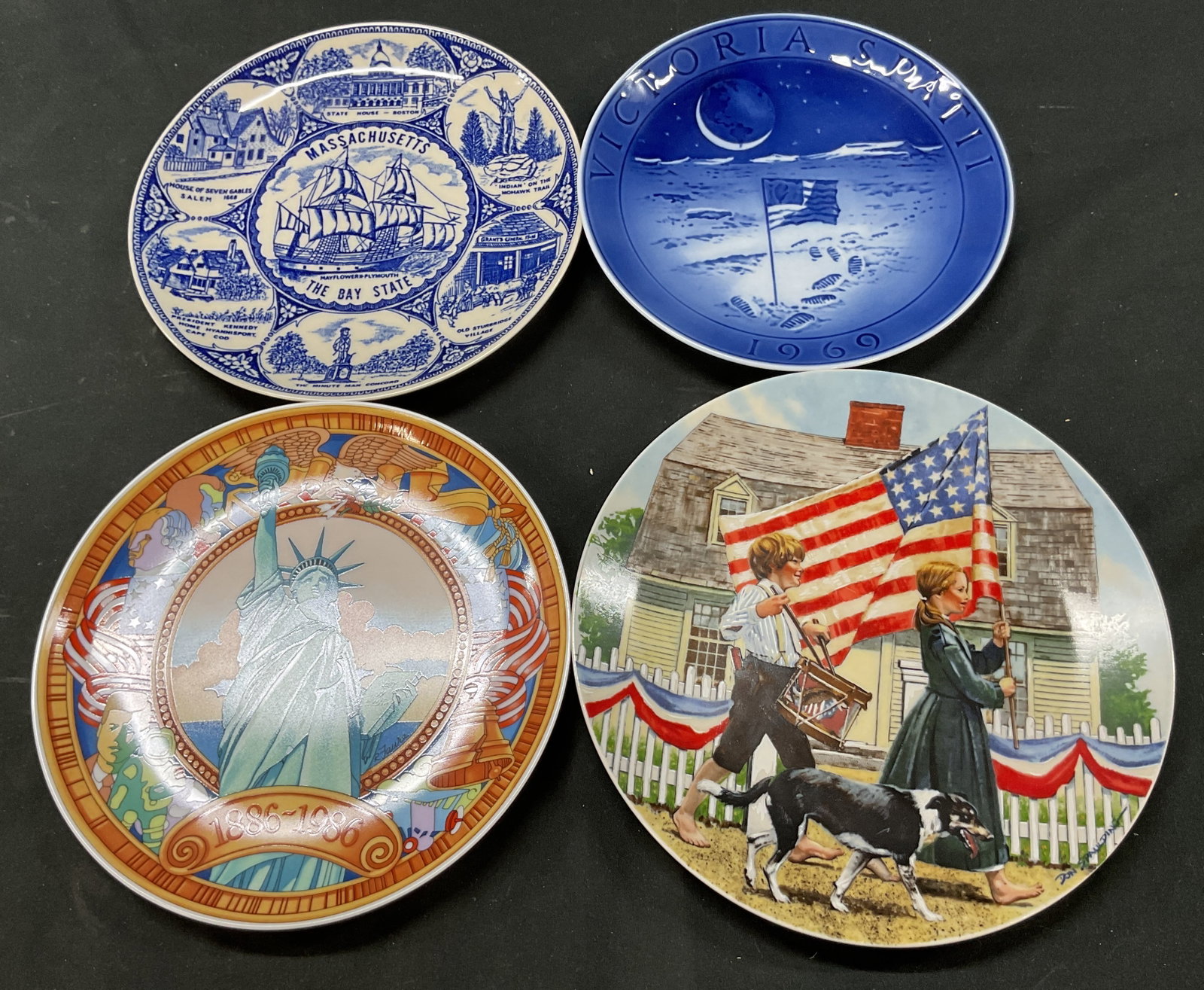 Lot 4 Assorted Souvenir Wall Plates Japan+: Lot of 4 assorted souvenir decorative wall plates. Royal Copenhagen porcelain Victoria Spatii 1969 plate, Denmark. Massachusetts porcelain plate, Japan. Edwin M Knowles fine china The Fourth Of July p