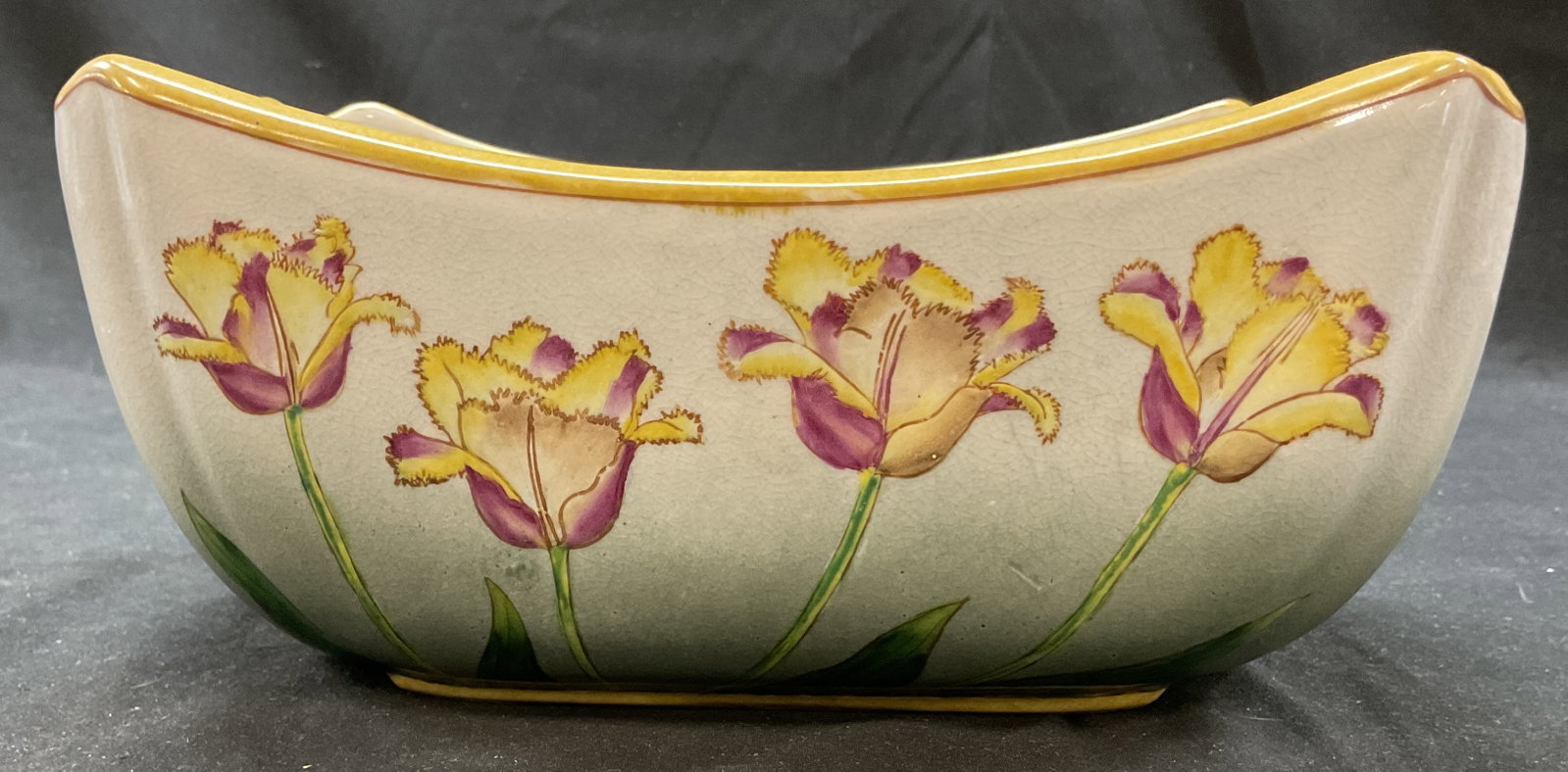 Vintage Ceramic Floral Planter: Vintage ceramic floral planter. Scalloped yellow edge. Rectangular shape. Embossed floral motifs hand painted in green, yellow, and purple. Measures approx 6 x 9.5 x 3.5 inches. Crazing. Planter,