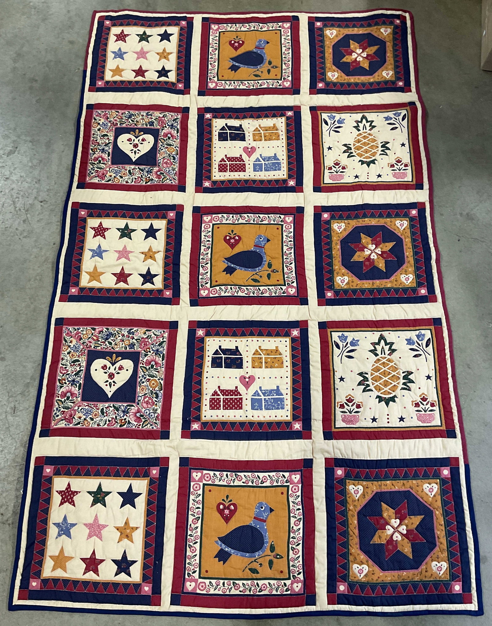 Vintage Signed Quilted Cotton Bird Heart Panel: Vintage 1992 signed Francoise quilted printed cotton panel. Patchwork design with stars, bird, pineapple, and house motifs. Measures approx. 74 x 44 inches. Some wear consistent with exposure. Quilt,
