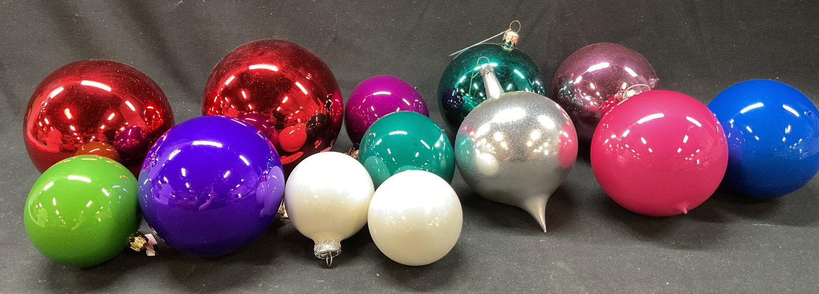 Grp Lot 13 Assorted Colorful Xmas Ornaments: Group lot of 13 assorted colorful glass Christmas ornaments. Some still have original tags. Sourced from Lord & Taylor and Neiman Marcus. Colors include red, blue, pink, green, and more. Size and