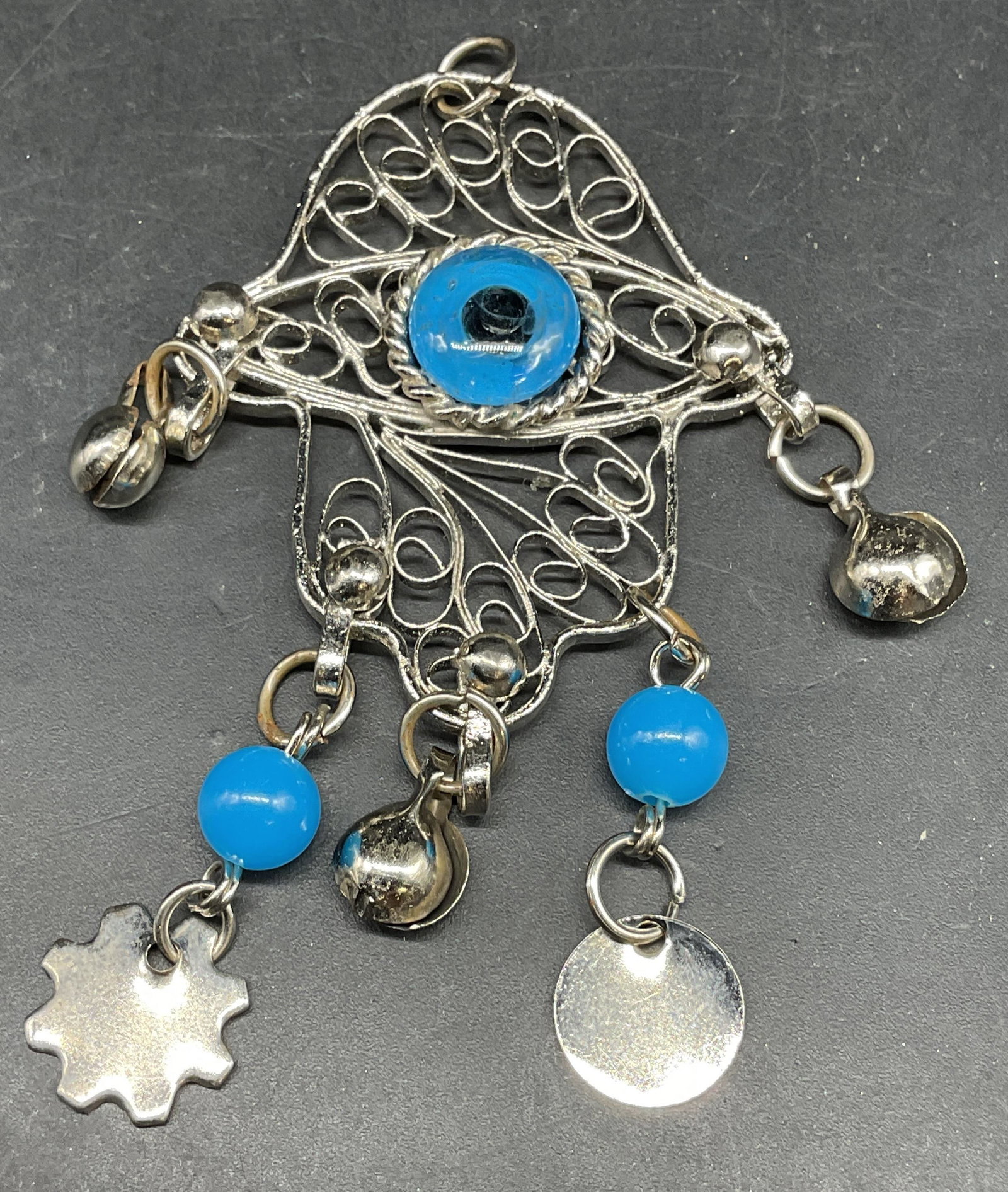 Silver Tone Filigree Hamsa Pendant: Silver tone filigree Hamsa pedant with blue beads. Measures approx. 2.75 x 1.75 inches. Some scratching. Jewelry, estate jewelry, costume jewelry, cocktail jewelry, fashion jewelry, accessories,