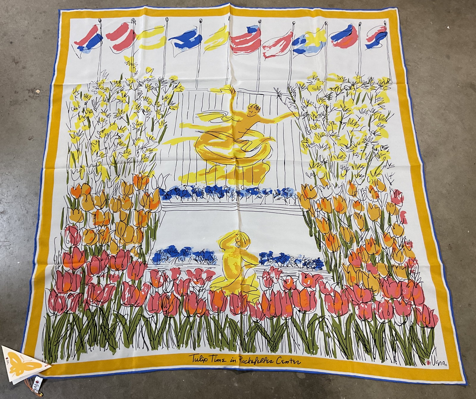 Vera Neumann Tulip Time Silk Scarf NWT: New with tag. Vera Neumann floral and figural silk scarf. Orange and blue border. Figures surrounded by floral and flag motifs in varying colors. Text on surface reads Tulip Time In Rockefeller