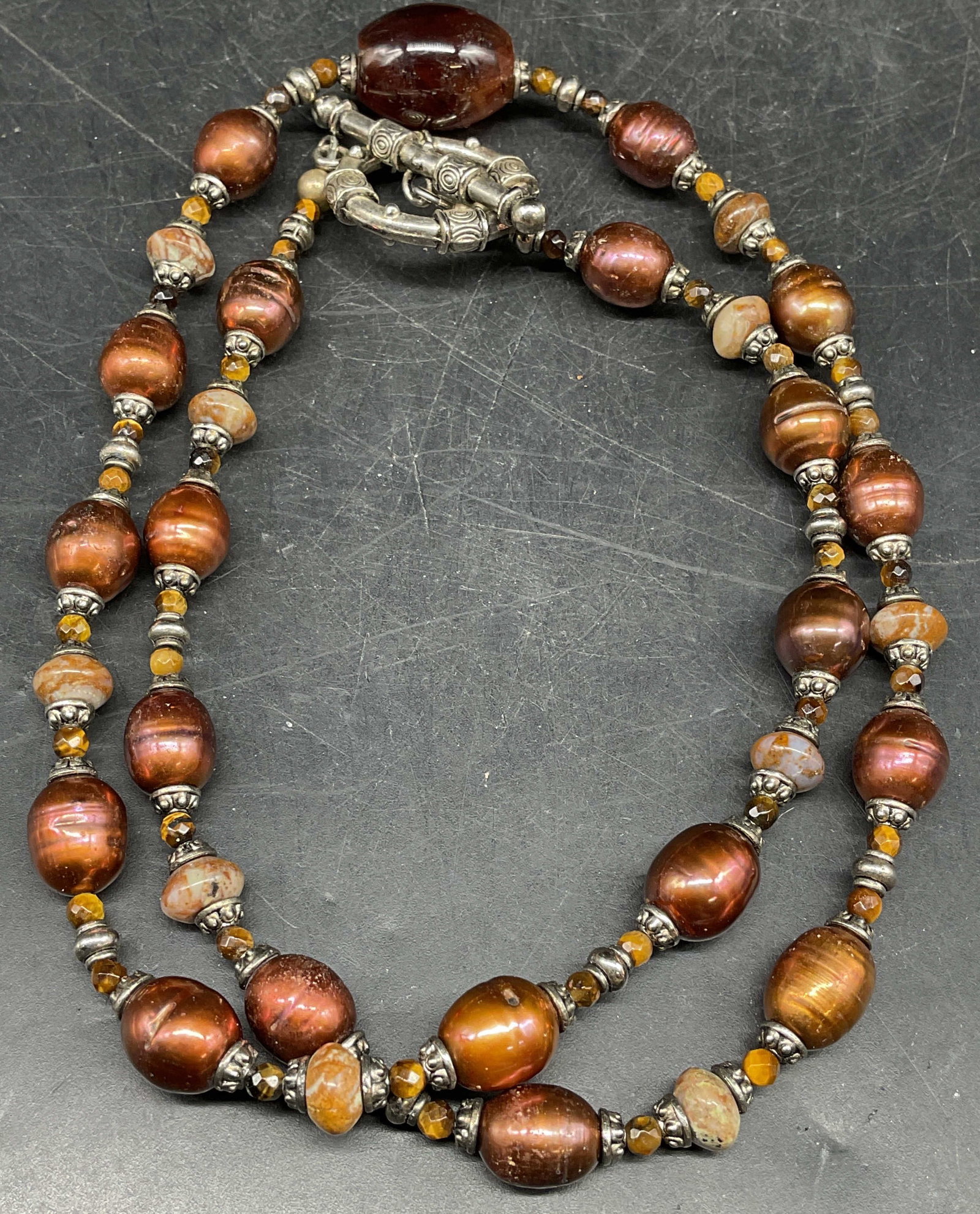 Pearl & Tigers Eye Beaded Necklace: Gold and copper toned pearl beaded necklace other tigers eye beads and semiprecious stones. Drop length 11.5 inches. Some scratching. Jewelry, estate jewelry, costume jewelry, cocktail jewelry, fashio