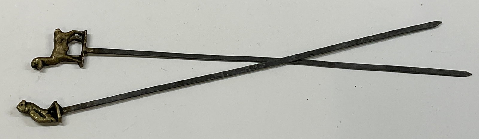 Lt2 VINTAGE Animal Finial Shish Kebab Skewers: 2 Vintage Shish Kebab Skewers. Steel with Brass Toned Finial of Llama and Gorilla. Tarnishing and Aging to Metal Present. Measures app 13in H x 1in W. Vintage, Shish Kebab, Skewers, Barbecue, Grilling