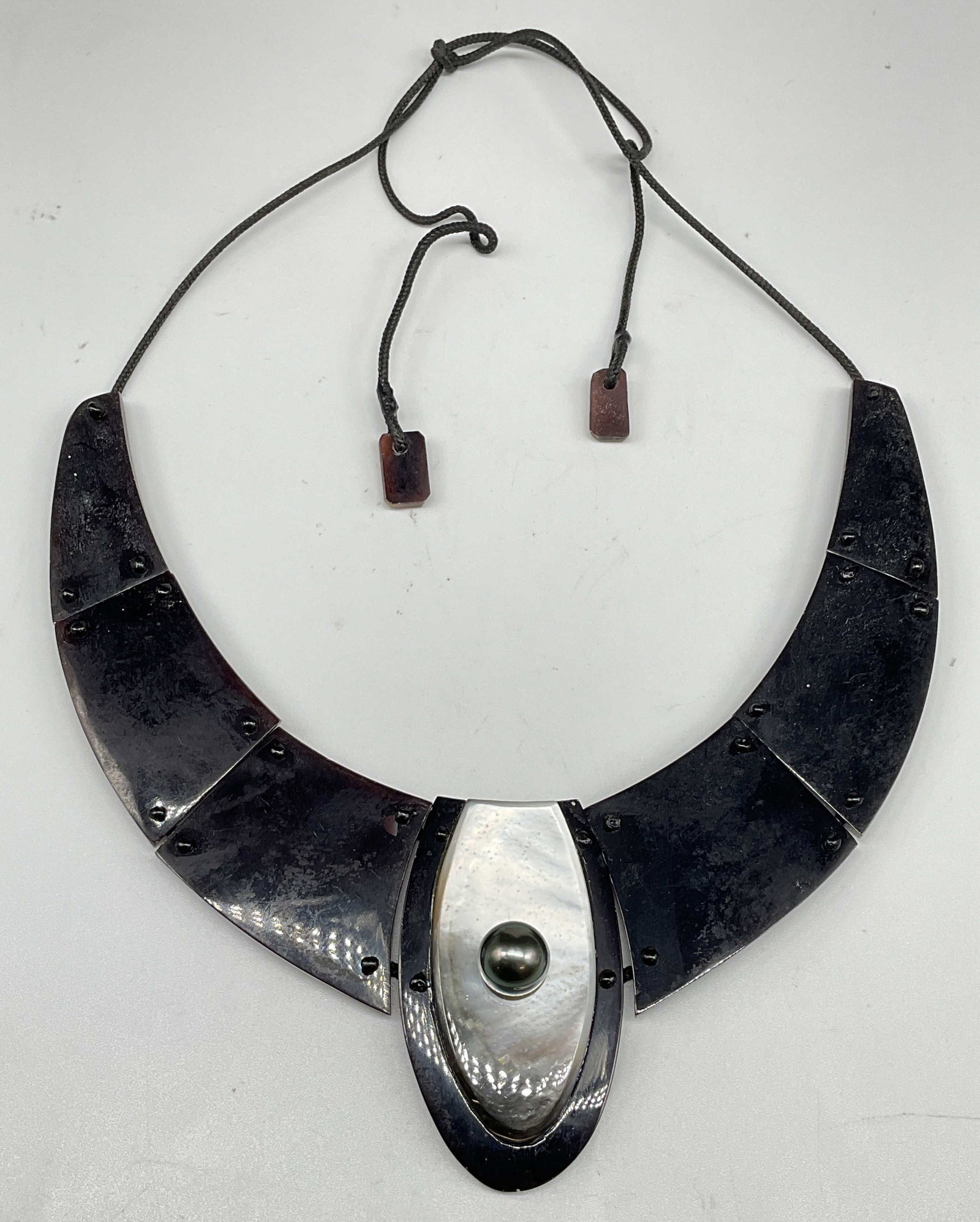Carved Horn & Mother of Pearl Collar Necklace: Vintage carved horn panel and mother of pearl collar necklace. Drop length 12 inches. Some scratching. Jewelry, estate jewelry, costume jewelry, cocktail jewelry, fashion jewelry, accessories, fashion