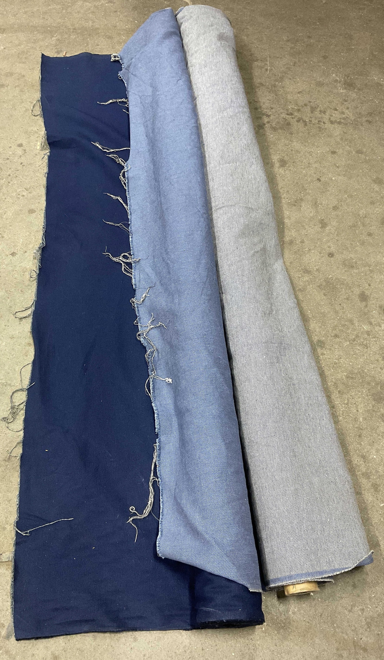Lt2 Solid Blue Fabric Bolts: Lt 2 Solid Blue Bolts of Fabric. Mixed Materials. Linen, Cotton, and More. Dark and Light Blue Textured. Not Measured, Unrolled, or Inspected. Sold As Is. Part of Large Collection of NYC Interior Desi