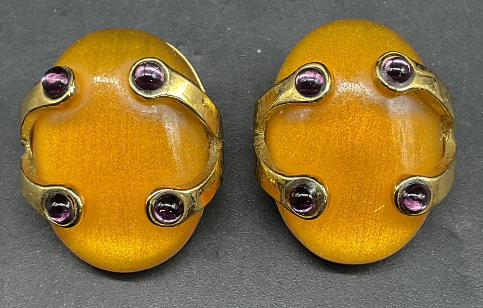 Vtg Repuca Gold Tone Lucite Earrings, Italy: Vintage Repuca gold tone amber and purple lucite cabochon earrings. Made in Italy. Measures approx. 1 x .75 inches. Some scratching. Jewelry, estate jewelry, costume jewelry, cocktail jewelry, fashion