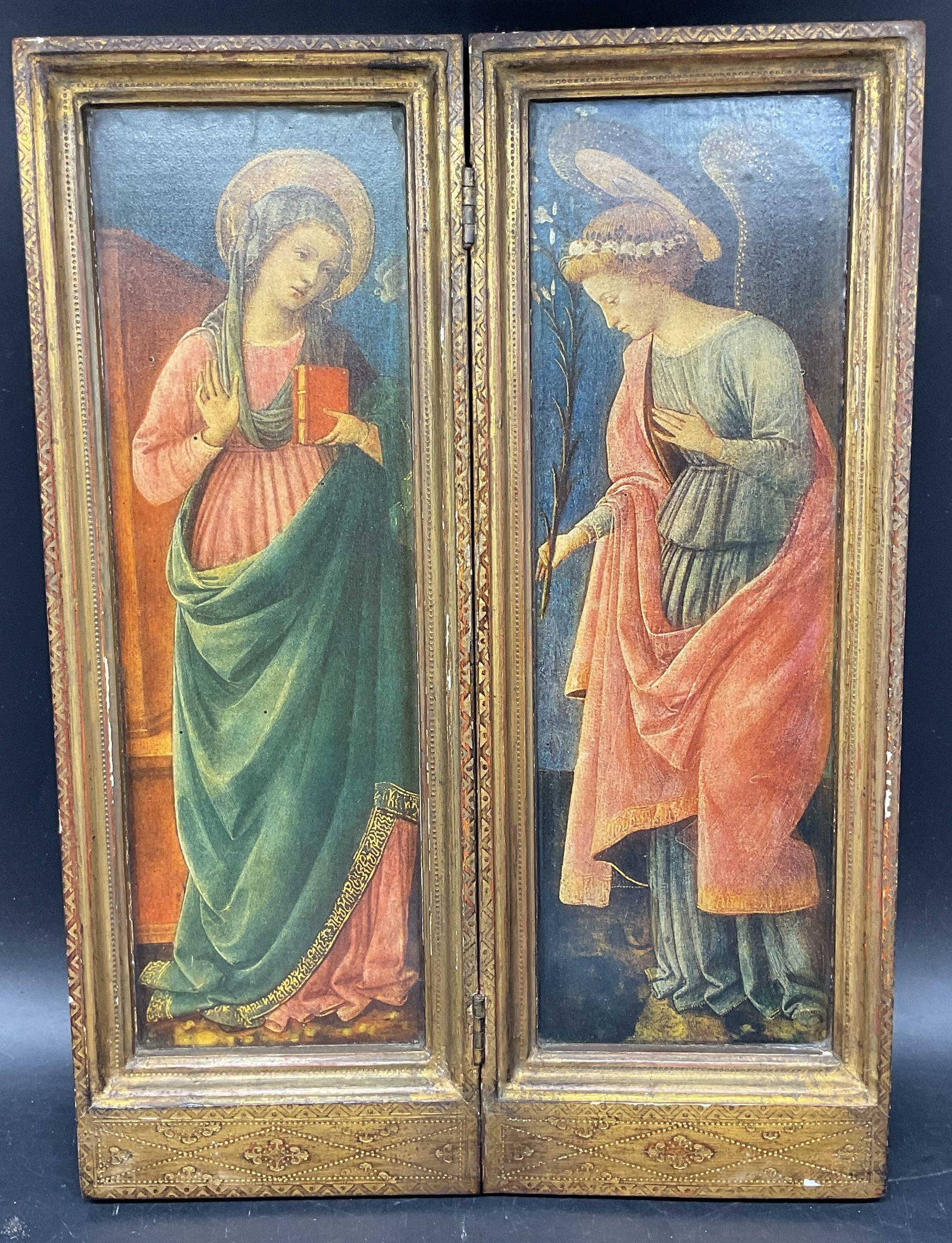 Florentine Prayer Diptych Annunciation Lithograph: Prayer diptych. Lithographs on board, Florentine style gilt wood with carved detail. The annunciation of Mary with the Archangel Gabriel. Measures approx. 16 x 11.5 inches. Some chips and scratching. 