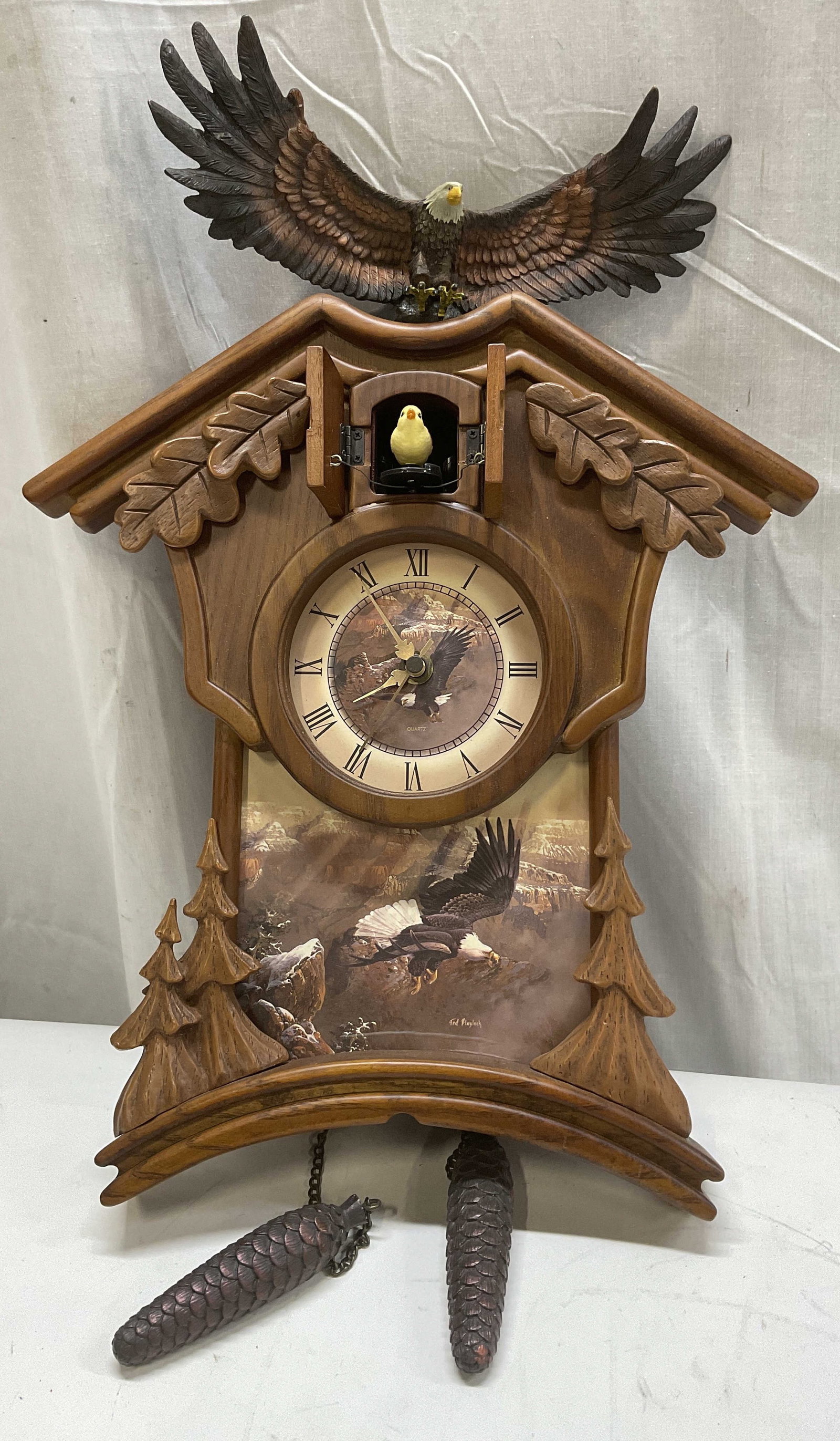 2007 Bradford Exchange Blaylock Eagle Cuckoo Clock: 2007 The Bradford Exchange Timeless Majesty by Ted Blaylock Bald Eagle Cuckoo Clock. Features a Bald Eagle Topper and Ted Blaylock Wildlife Art on the Clock Face. Chips Present. Eagle Wing Has Been Re