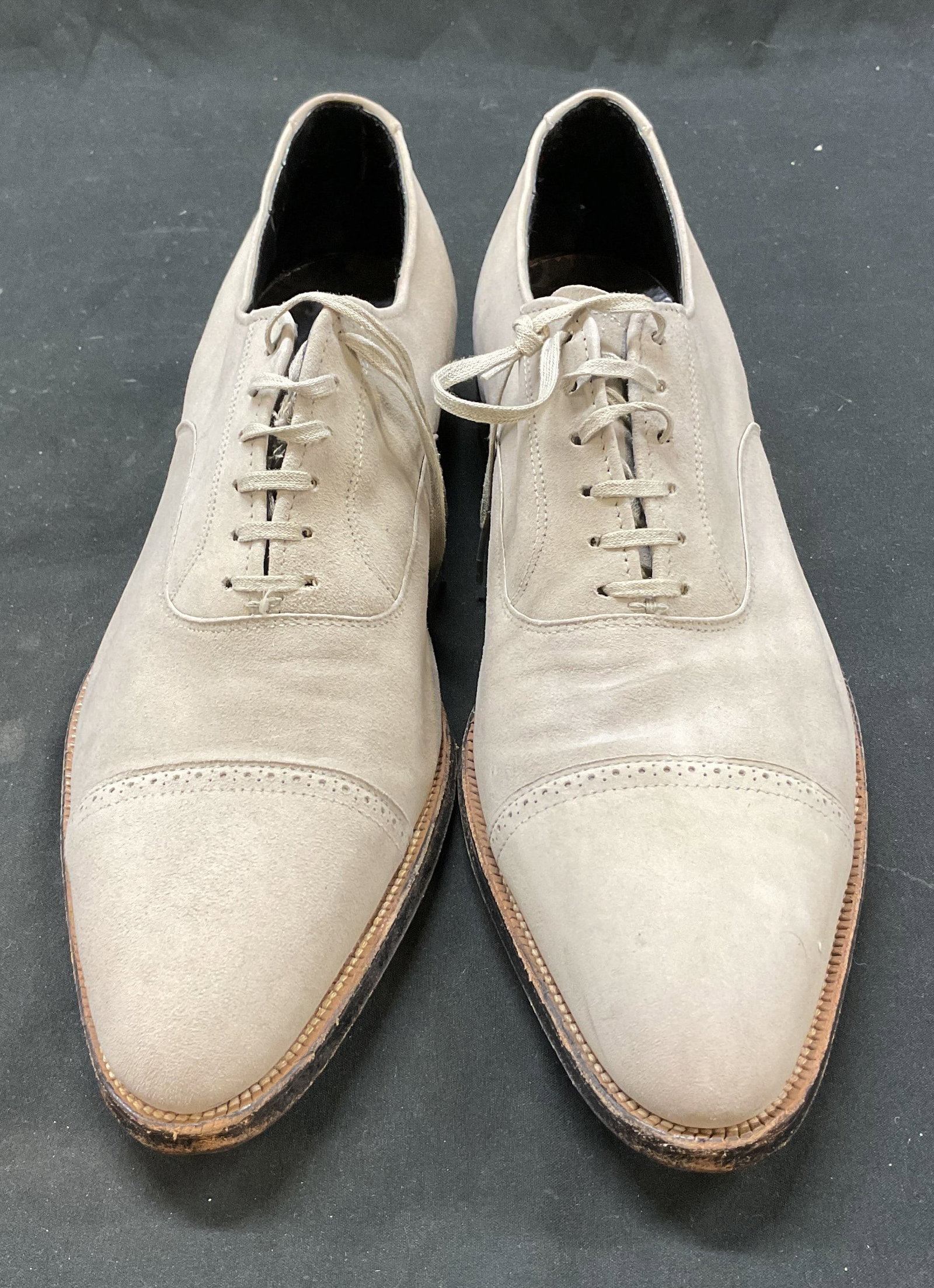 Thomas Grey Suede Loafers: Thomas grey suede loafers. Size 9. Heeled shoe. Laces and ornate design. Other visible markings, read illegibly. Some blemishes. Loafers, shoes, Thomas, wearables, outerwear, fashion, accessories. 4CS