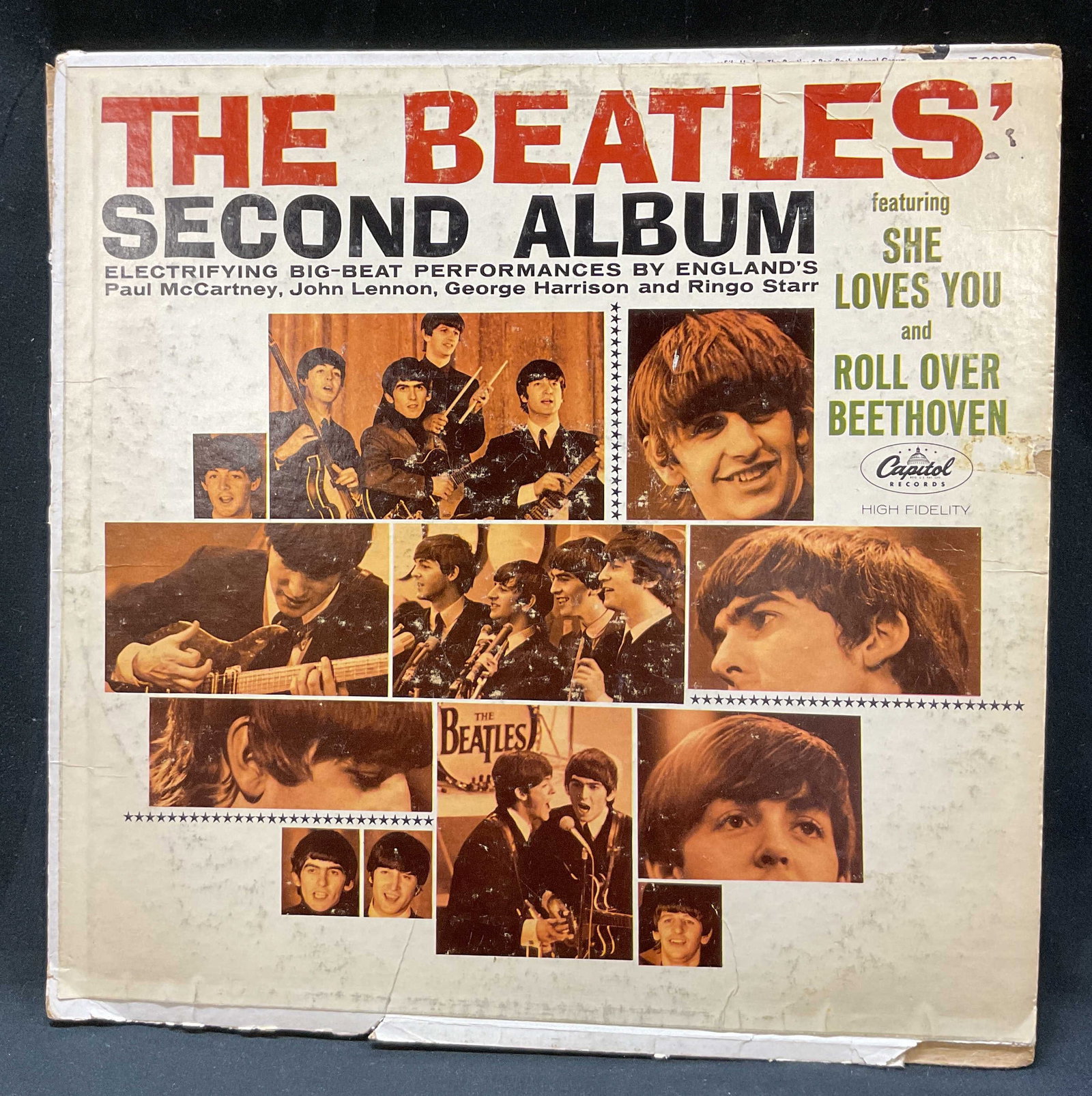 1964 The Beatles Second Album Vinyl Record USA: Second Album by The Beatles. Vinyl made in USA. Produced by George Martin. Manufactured by Capitol Records, 1964. Illustrations and text as photographed here. Measures approx 12.5 x 12.5 inches. Surfa