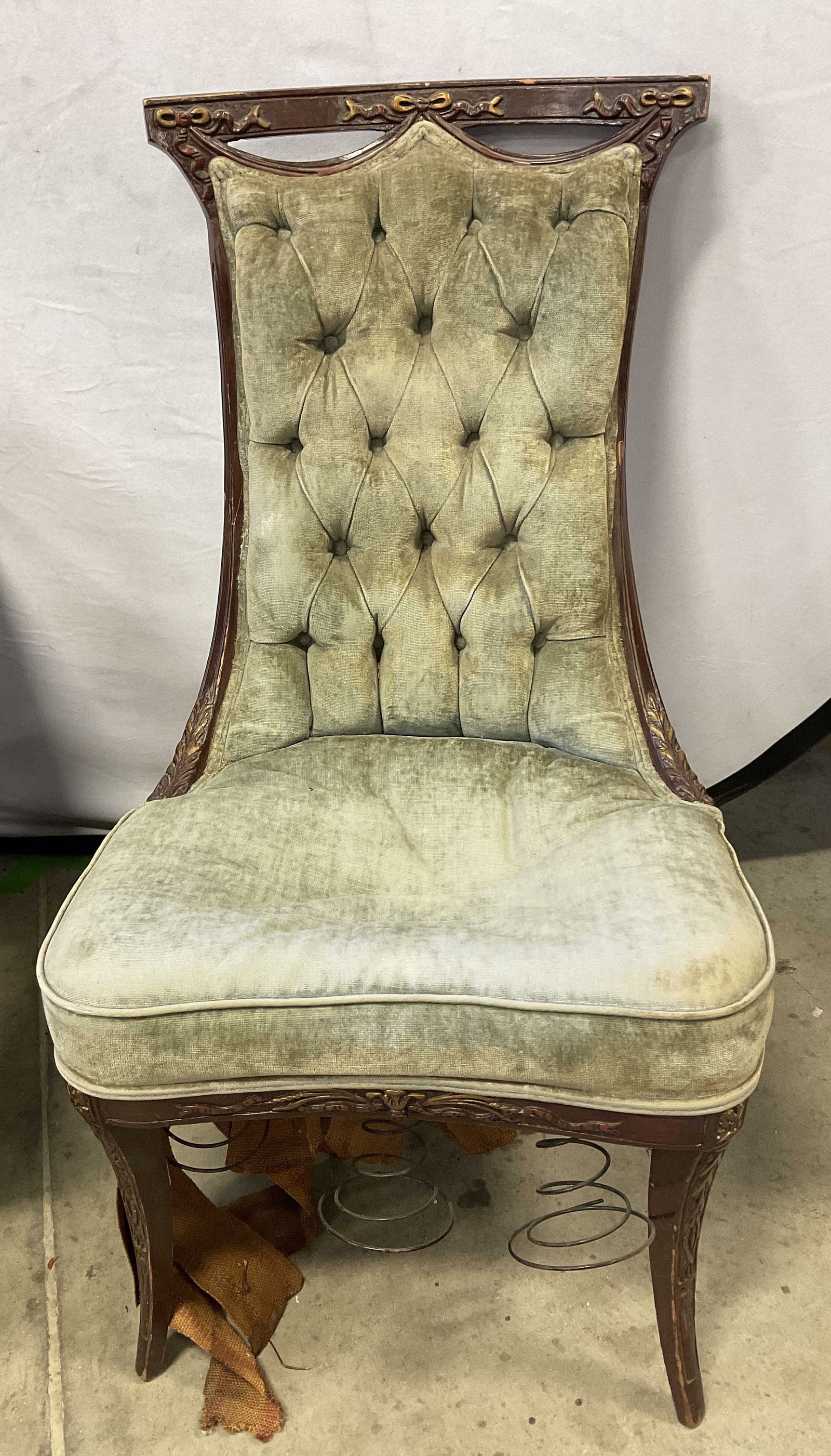 Victorian Green Upholstery Walnut Nursing Chair: Victorian Green Buttoned Fabric Upholstery and Walnut Nursing Chair. Carved Cresting Rail. Surface Wear Including Discoloration, Scratching, and Broken Webbing Present. Measures app 38in H x 21in L x 