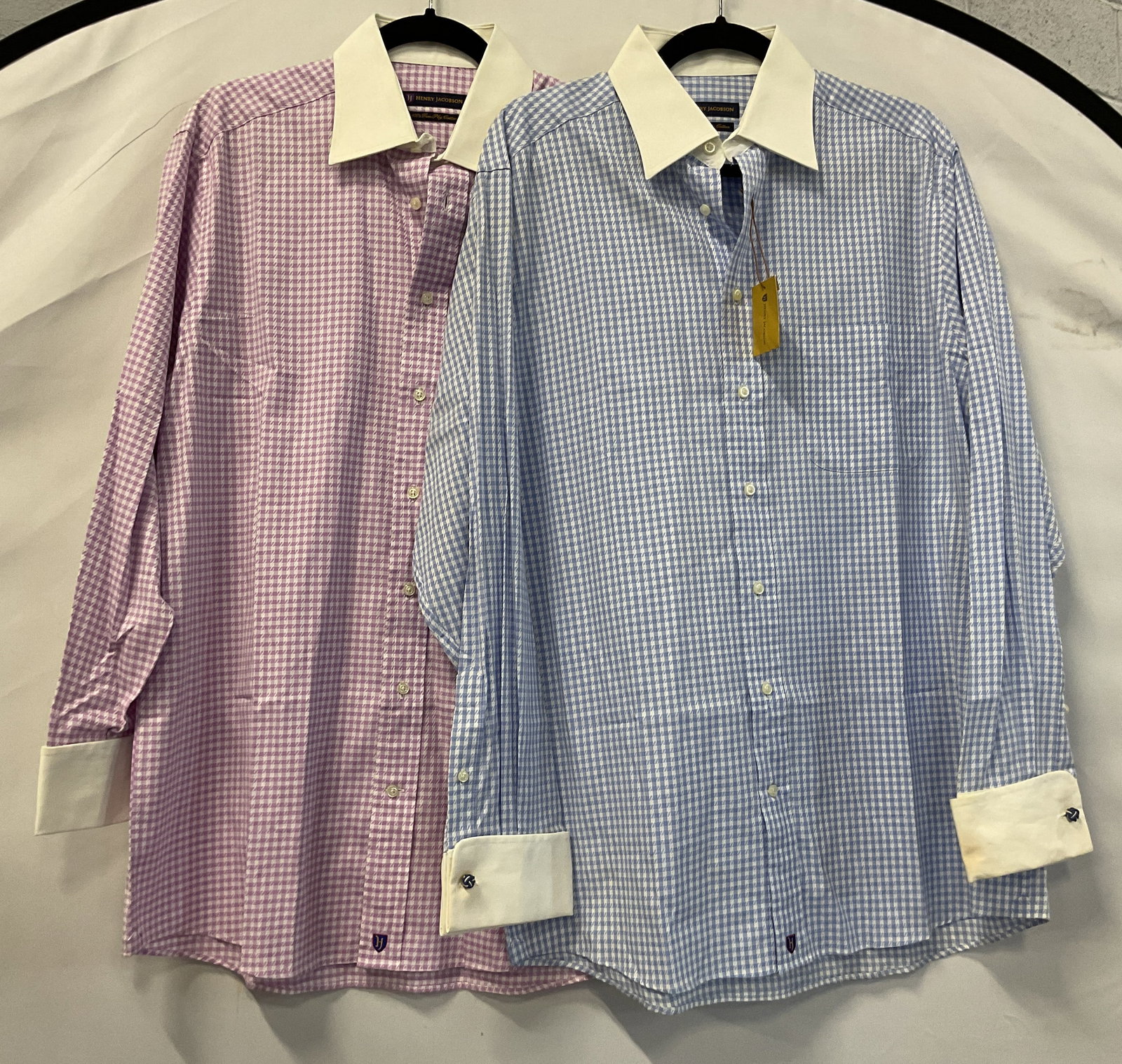 Lot 2 Henry Jacobson Button Down Shirts NWT: Lot of 2 Henry Jacobson button down shirts. One is new with tag. Both are 100% two ply cotton. One is size 15.5 34/35. The other is size 15.5 32/33. Collared and buttoned. Long sleeve. Front pocket. B