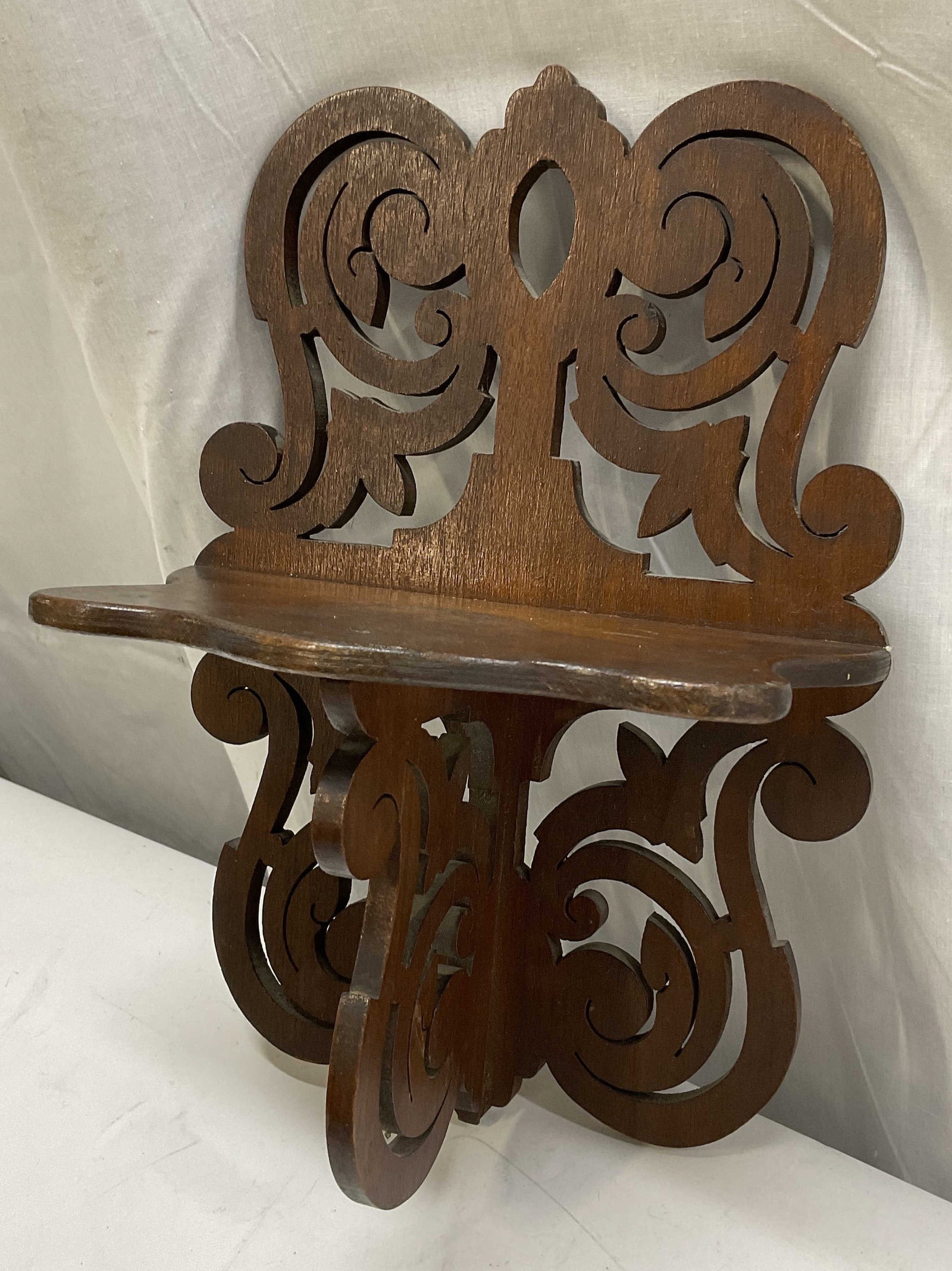 VINTAGE Dark Wood Wall Shelf: Vintage Dark Wood Wall Shelf with Intricate Scrollwork Design. Condition Consistent With Exposure. Measures app 13in H x 9in L x 5.25in W. Vintage, Dark Wood, Wooden, Wall Shelf, Scrollwork, Trinket S