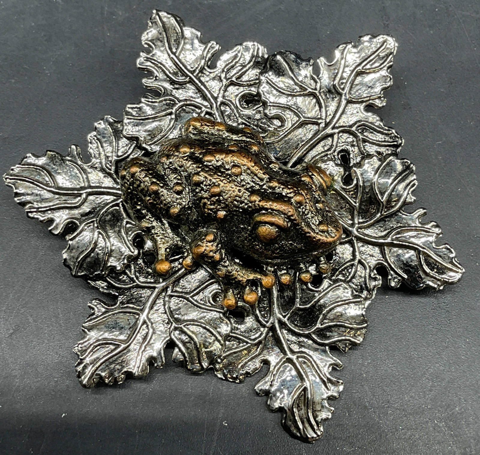Sylvia Dahl Frog & Maple Leaf Scarf Clip: Vintage Sylvia Dahl frog and maple leaf silver and gold tone scarf clip. Measures approx. 2.5 inches wide. Some scratching. Jewelry, estate jewelry, costume jewelry, cocktail jewelry, fashion jewelry,