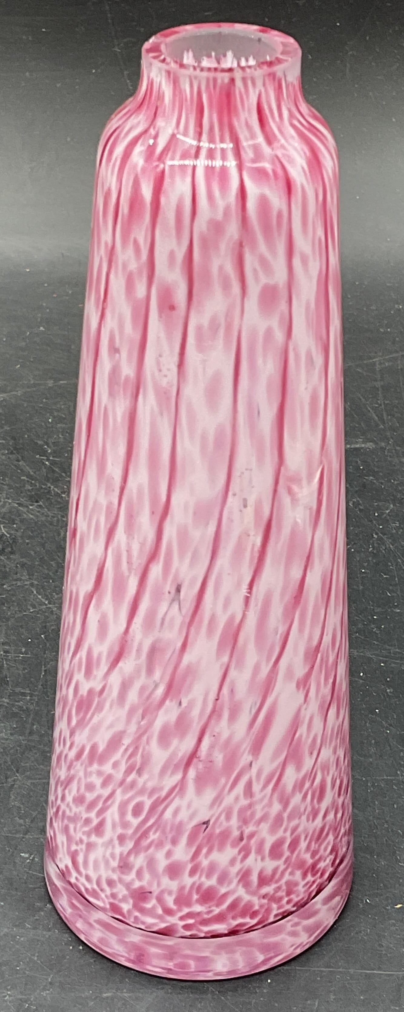 Cesars World Pink Swirl Art Glass Vase: Cesars World pink swirl art glass vase or bottle. Measures approx. 2.25 x 6.25 inches. Some scratching. Chip to rim. Cesars world vase, pink vase, art glass vase, home decor, table decor, 10 s
