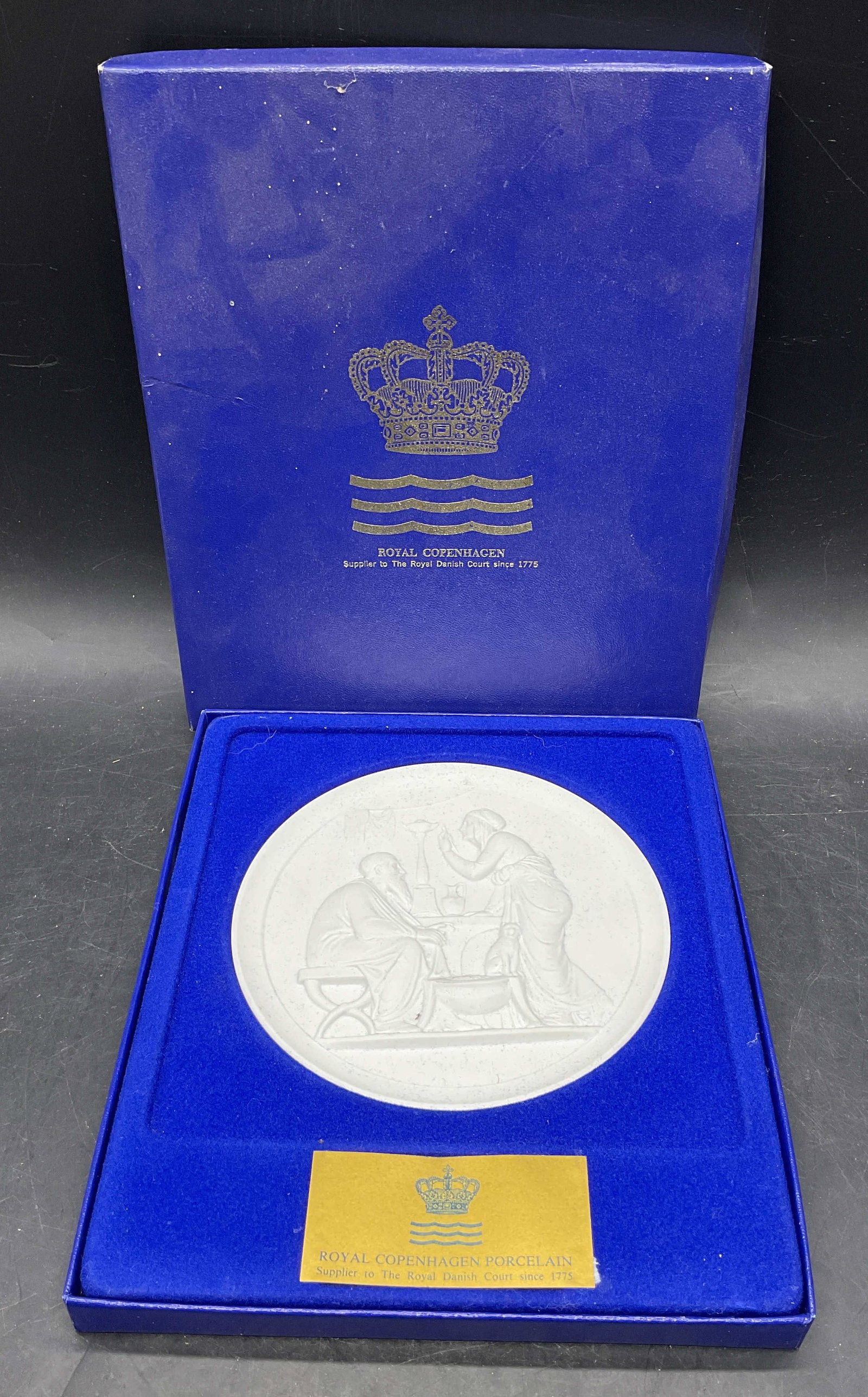 Royal Copenhagen Winter Bisque Porc Plaque NIB: Royal Copenhagen bisque porcelain plaque, Winter. Four Seasons of Life series. New in box. Made in Denmark. Measures approx. 5.5 inches wide. Some wear consistent with exposure. Royal Copenhagen plaqu