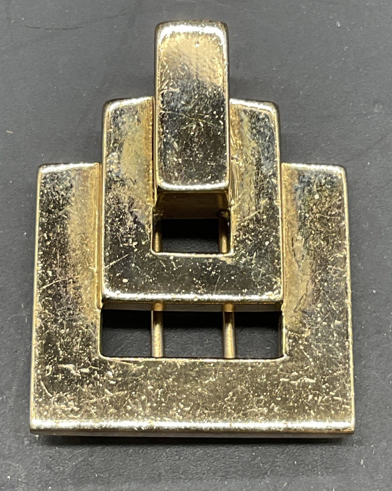 Vintage Monet Gold Tone Geometric Fur Clip: Vintage Monet gold tone geometric square art deco style fur/dress/sweater clip. Measures approx. 1.25 x 1 inches. Some scratching. Jewelry, estate jewelry, costume jewelry, cocktail jewelry, fashion j