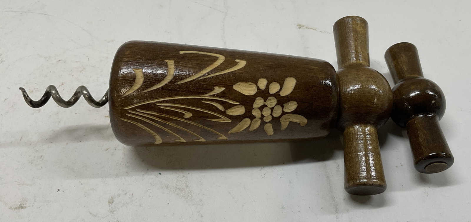 VINTAGE Engraved Floral Wooden Wine Corkscrew: Vintage Engraved Floral Wooden Wine Corkscrew. Condition Consistent With Exposure. Measures app 7in H x 3in L. Vintage, Engraved, Florals, Wooden, Woodcraft, Art, Wine, Corkscrew, Bar Accessories, Bar
