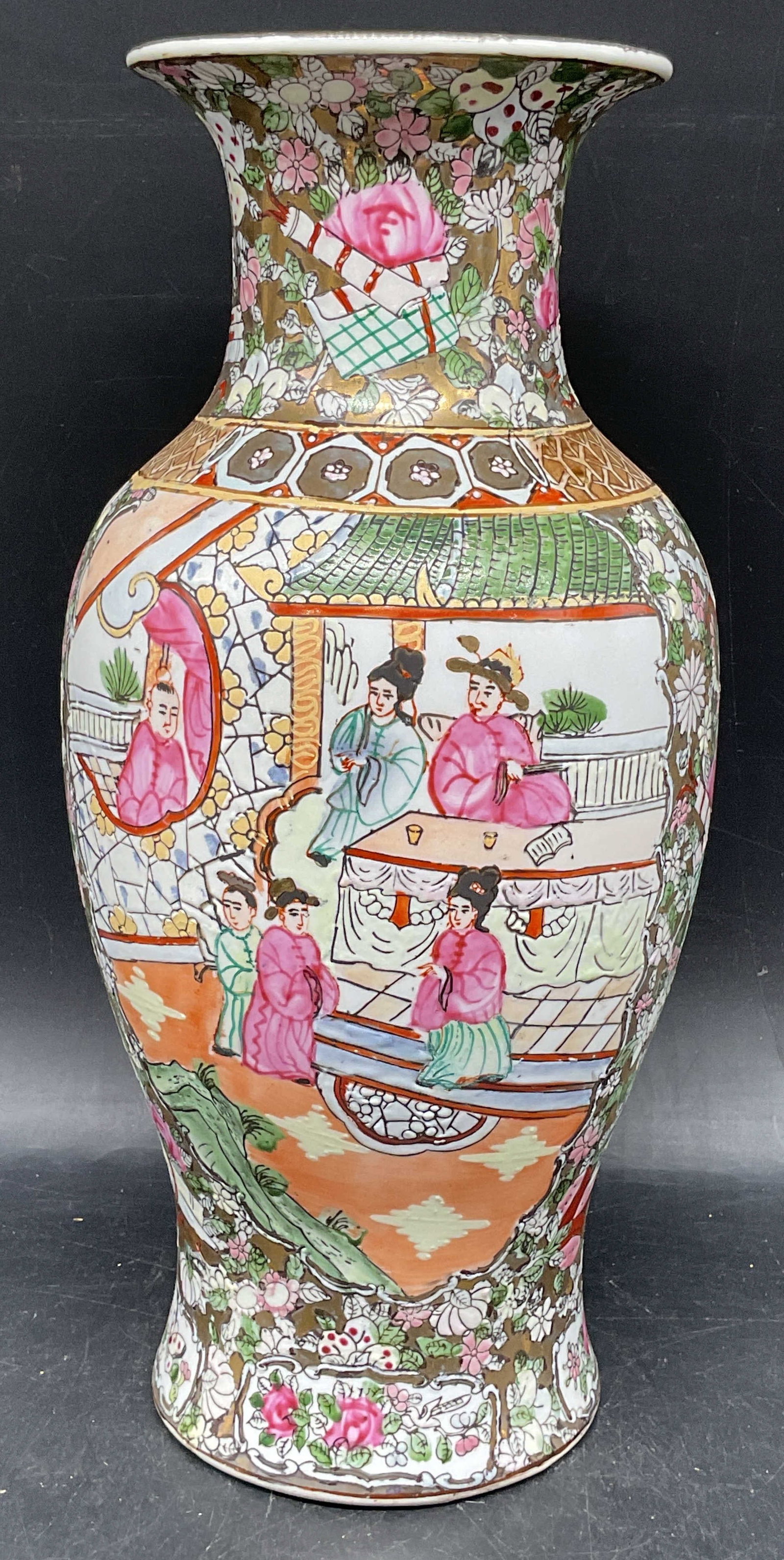 Chinese Rose Medallion Enameled Porcelain Vase: Chinese Rose Medallion porcelain vase. Gilt and hand painted enamel with traditional figure scenes. Appears to be marked illegibly on underside. Measures approx. 5.5 x 12.5 inches. Some scratching and