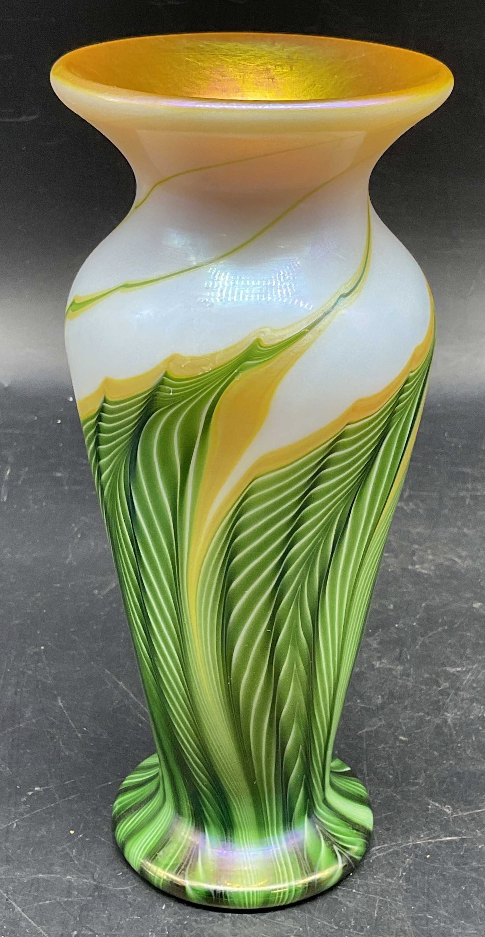2001 Lundberg Pulled Feather Art Glass Vase: 2001 Lundberg Studios hand blown art glass with pulled feather design in green, white, and gold. Numbered 020822. Measures approx. 3.5 x 7.25 inches. Some scratching. Lundberg vase, art glass vase, pu