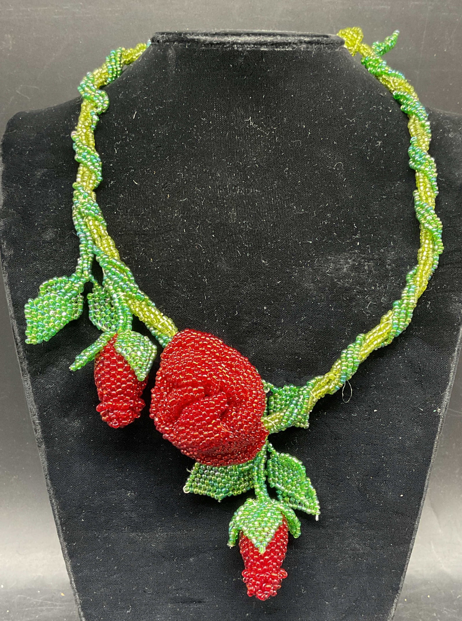 Beaded Rose Pendant Statement Necklace: Vintage fully beaded rose motif pendant necklace in green and red. Drop length 9 inches. Some scratching. Jewelry, estate jewelry, costume jewelry, fashion jewelry, cocktail jewelry, accessories, fash