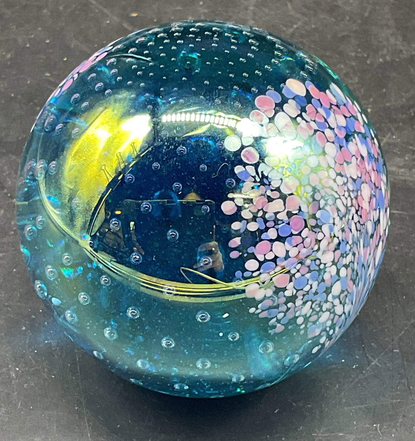 Glass Eye Studio Controlled Bubble Paperweight: 1995 GES Glass Eye Studio hand blown art glass paperweight, iridescent blue with confetti design and controlled bubble detail. Measures approx. 2.5 x 2.5 inches. Some scratching. Glass eye studio pape