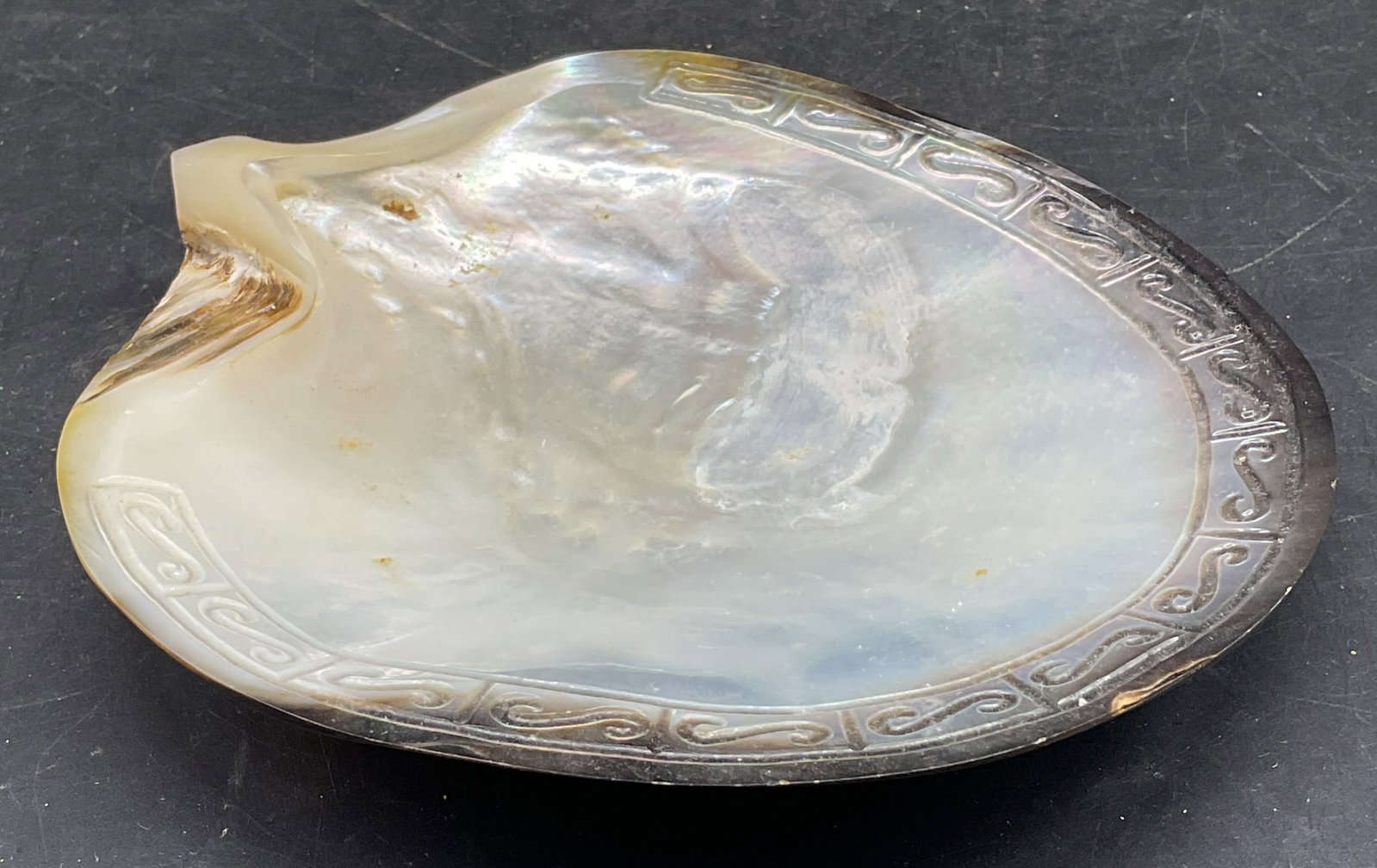 Vintage Carved Shell Pearl Footed Dish: Vintage carved shell dish with pearl footed base. Measures approx. 6 x 5 x 1 inches. Some scratching. Shell dish, pearl dish, collectibles, home decor, home accessories, table decor, table accessories