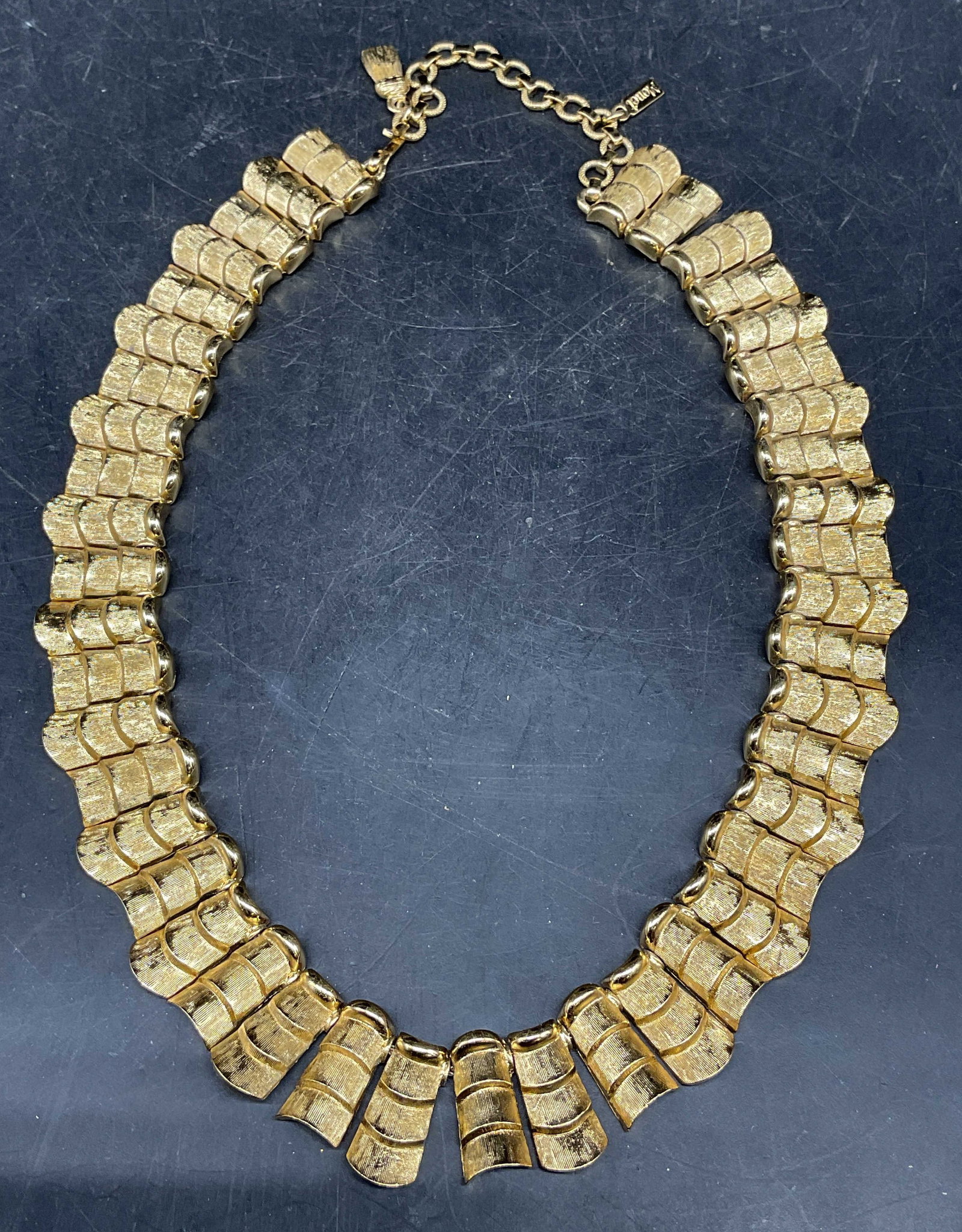 Vintage Monet Gold Tone Panel Collar Necklace: Vintage Monet gold tone panel collar necklace. Drop length 7.5 inches. Some scratching. Jewelry, estate jewelry, costume jewelry, cocktail jewelry, fashion jewelry, accessories, fashion jewelry, acces