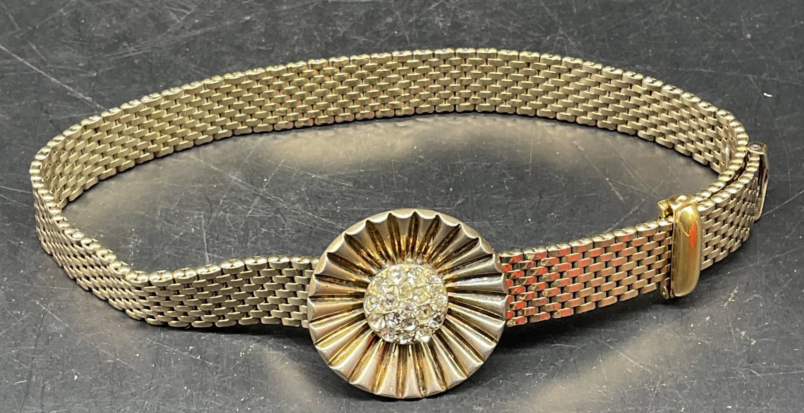 Kreisler Gold Tone Rhinestone Choker Necklace: Vintage Kreisler gold tone mesh chain choker necklace with rhinestone flower pendant and buckle clasp. Measures approx. 14 inches long. Some scratching. Clasp does not secure. Jewelry, estate jewelry,