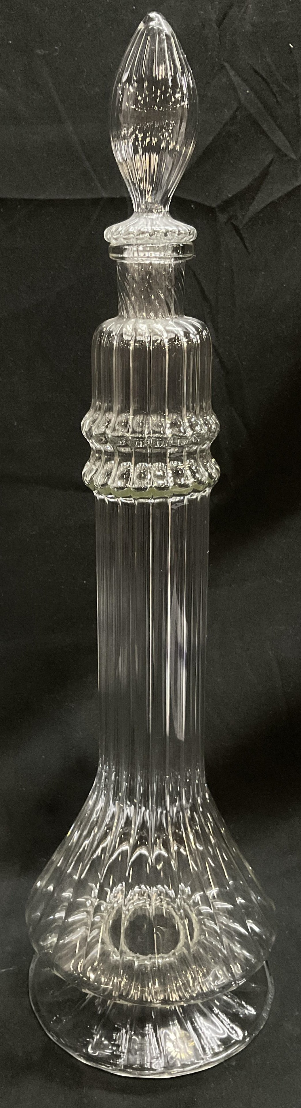 ANTQ Hand-Blown Chantilly Sty Decanter ROMANIA: Antique Hand-Blown Clear Glass Chantilly Style Decanter. Ribbed Body. Spire-Style Stopper. Made in Romania. Condition Consistent With Exposure. Measures to Stopper app 17.75in H x 5in Diam. Antique Gl