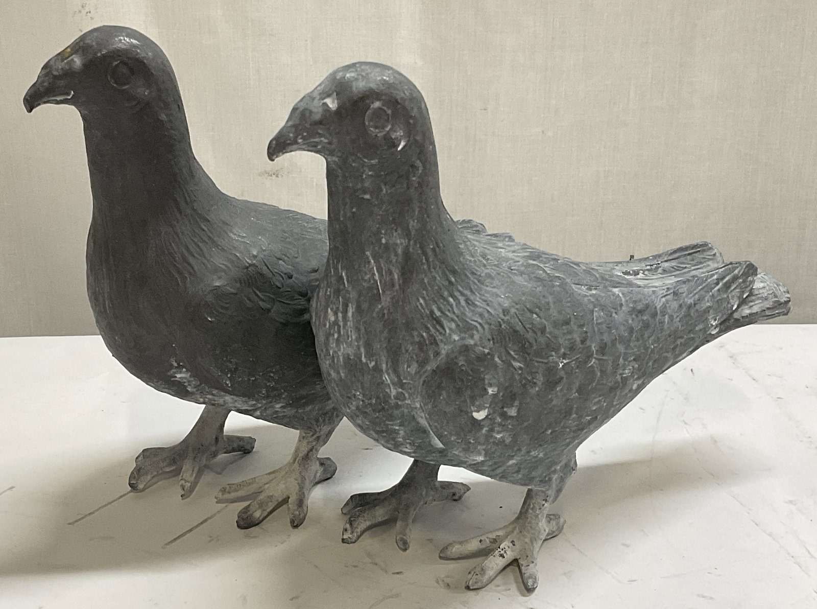 Lt2 Vintage Cast-Metal Pigeon Statues BELGIUM: 2 Vintage Cast-Metal Pigeon Statues. Grey and White Finish. Has Significant Weight. Made in Belgium. Condition Consistent With Exposure. Measures app 7in H x 9.5in L. Vintage Statues, Cast-Metal, Pige