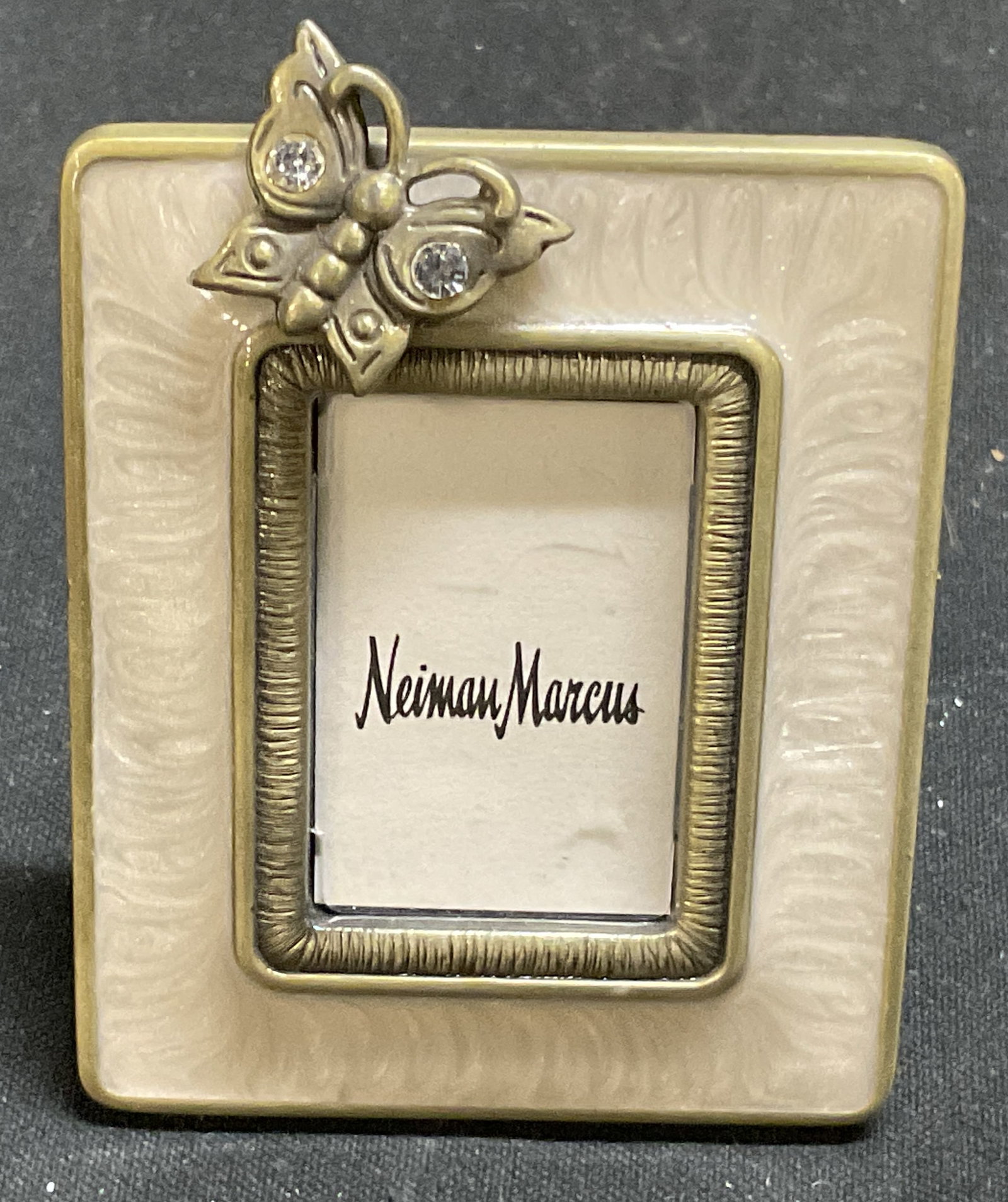 Jay Strongwater Swarovski Crystal Butterfly Flame: Jay Strongwater Swarovski Crystal Embedded Butterfly Miniature Picture Flame. Brass-Toned with Cream Swirled Enamel. Made Exclusively for Neiman Marcus Stores. Features Stand and Clip at the Back. Mea
