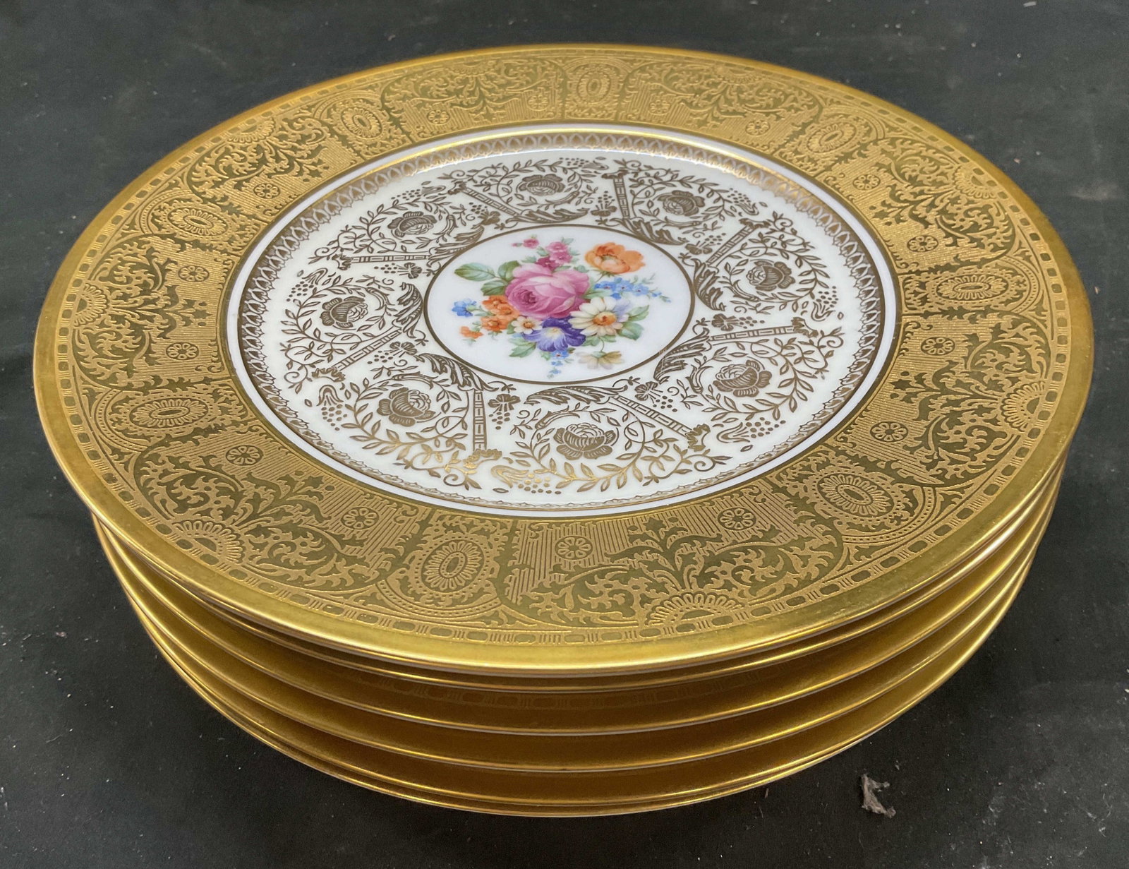 Set 6 Gold Encrusted Floral Czech Dinner Plates: Set of six hand painted floral centers, each plate with different floral design in pinks, blues, violets and oranges, and wide encrusted 22 k gold border, each measures diameter app 10.5 inches, no ch