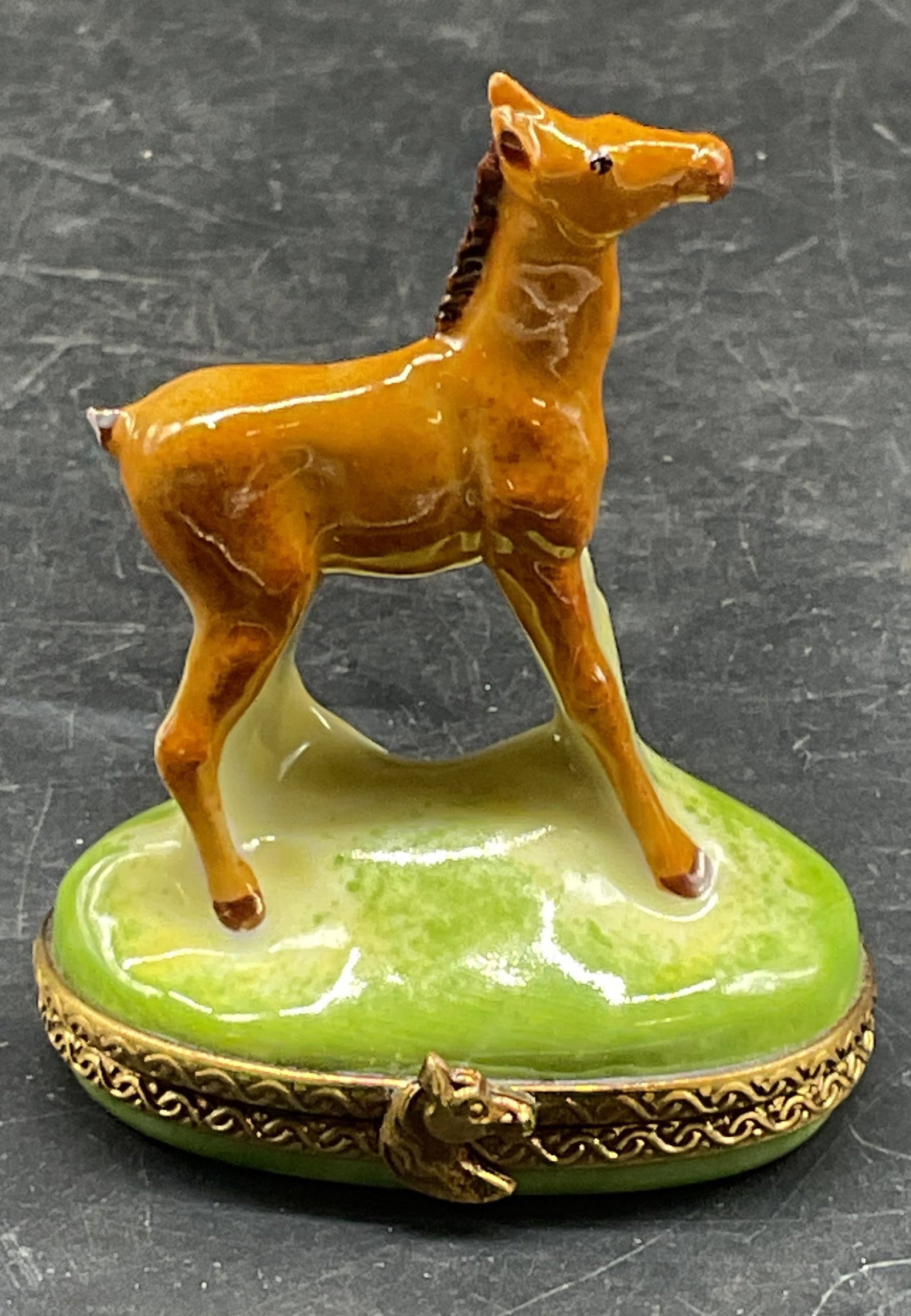 Limoges Porcelain Horse Trinket Box France: Signed Limoges porcelain horse motif trinket box. Signed Eximious Destieux. Made in France. Hand painted. Measures approx. 1.75 x 1.25 x 2.25 inches. Wear including scratching and chip to tail. Limoge