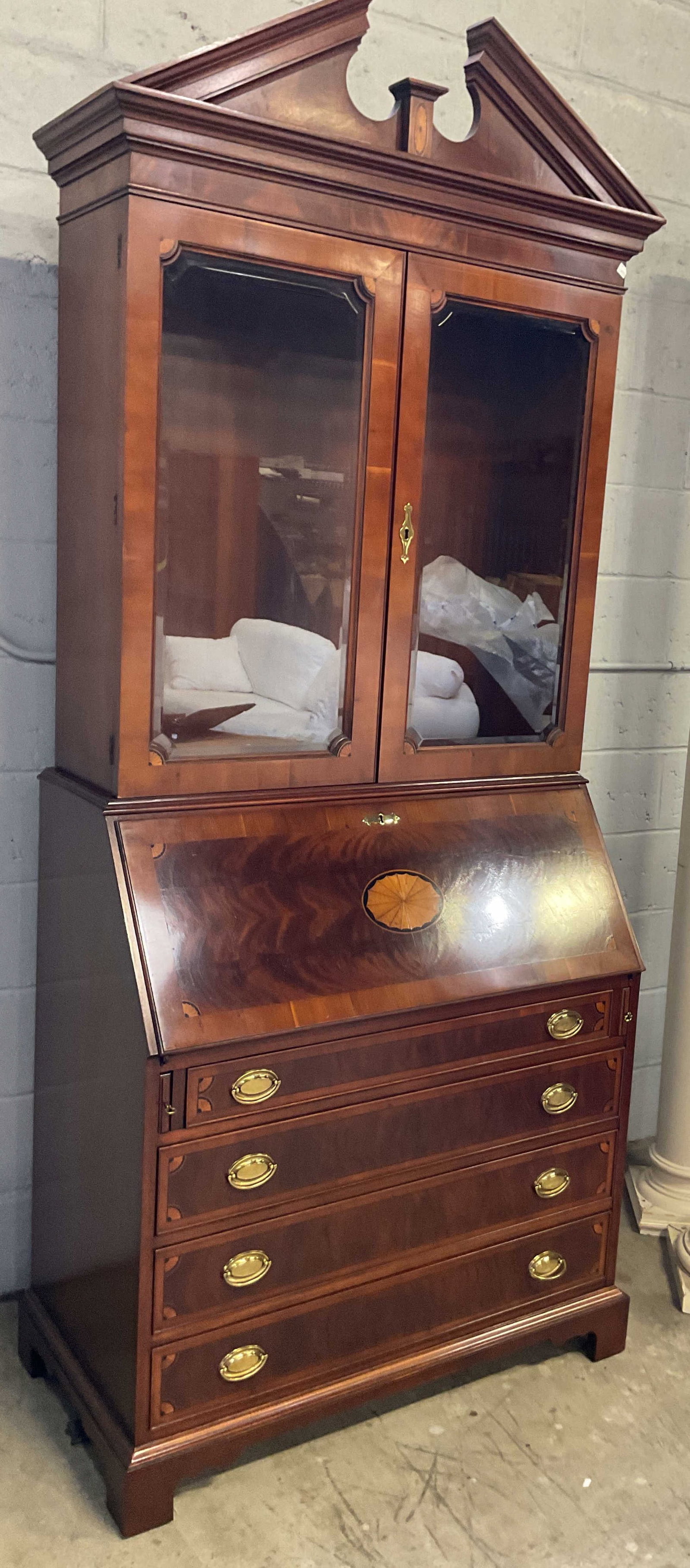 Hepplewhite Style Mahogany Secretary Desk: HEKMAN fine furniture, Hepplewhite Style Flame Mahogany se restart Desk with Book case, the top is crowned with a swan neck pediment arch,over a glass front two door upper cabinet with space for shelv