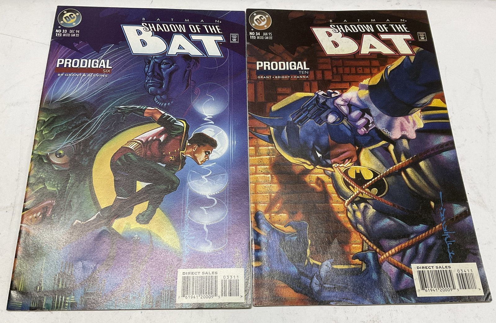 Lt2 94-95 DC Batman Shadow of Bat Comic Books: 2 DC Comics Batman Shadow of the Bat Comic Books. Includes Issues #33 and #34. Published 1994-1995. Written by Alan Grant and Illustrated By MD Bright, Scott Hanna, and Bret Blevins. Some Creasing. Me