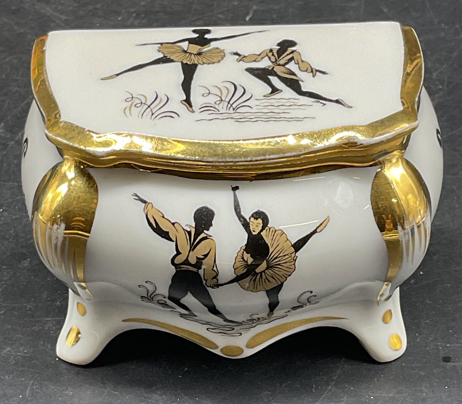 Limoges Porcelain Ballet Trinket Box France: Limoges porcelain ballet motif trinket box. Hand painted. Made in France. Measures approx. 3.5 x 2.25 x 2.25 inches. Some scratching. Limoges trinket box, porcelain trinket box, ballet trinket box, co
